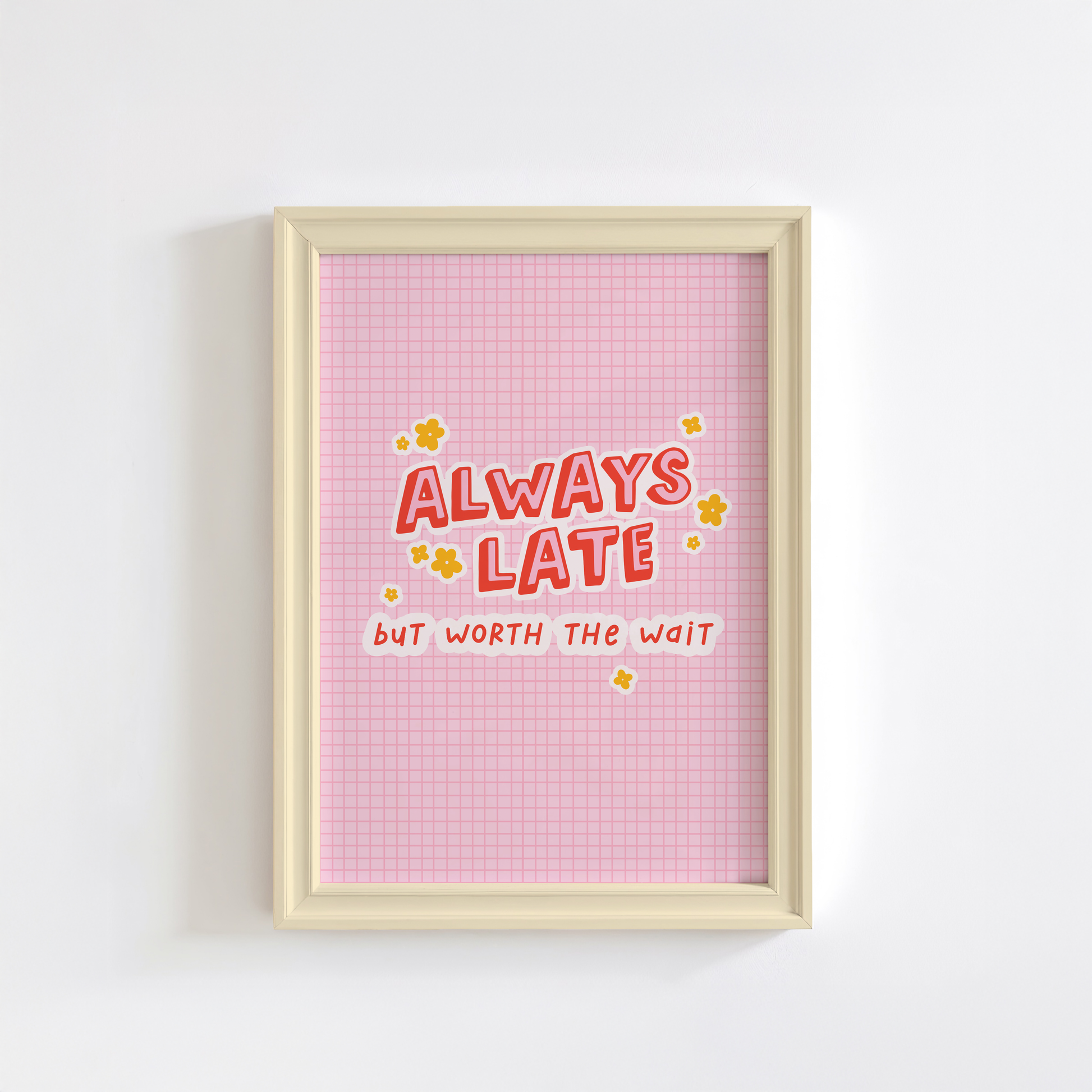 A colourful pink print with a quote saying always late but worth the wait in a contrasting red font.