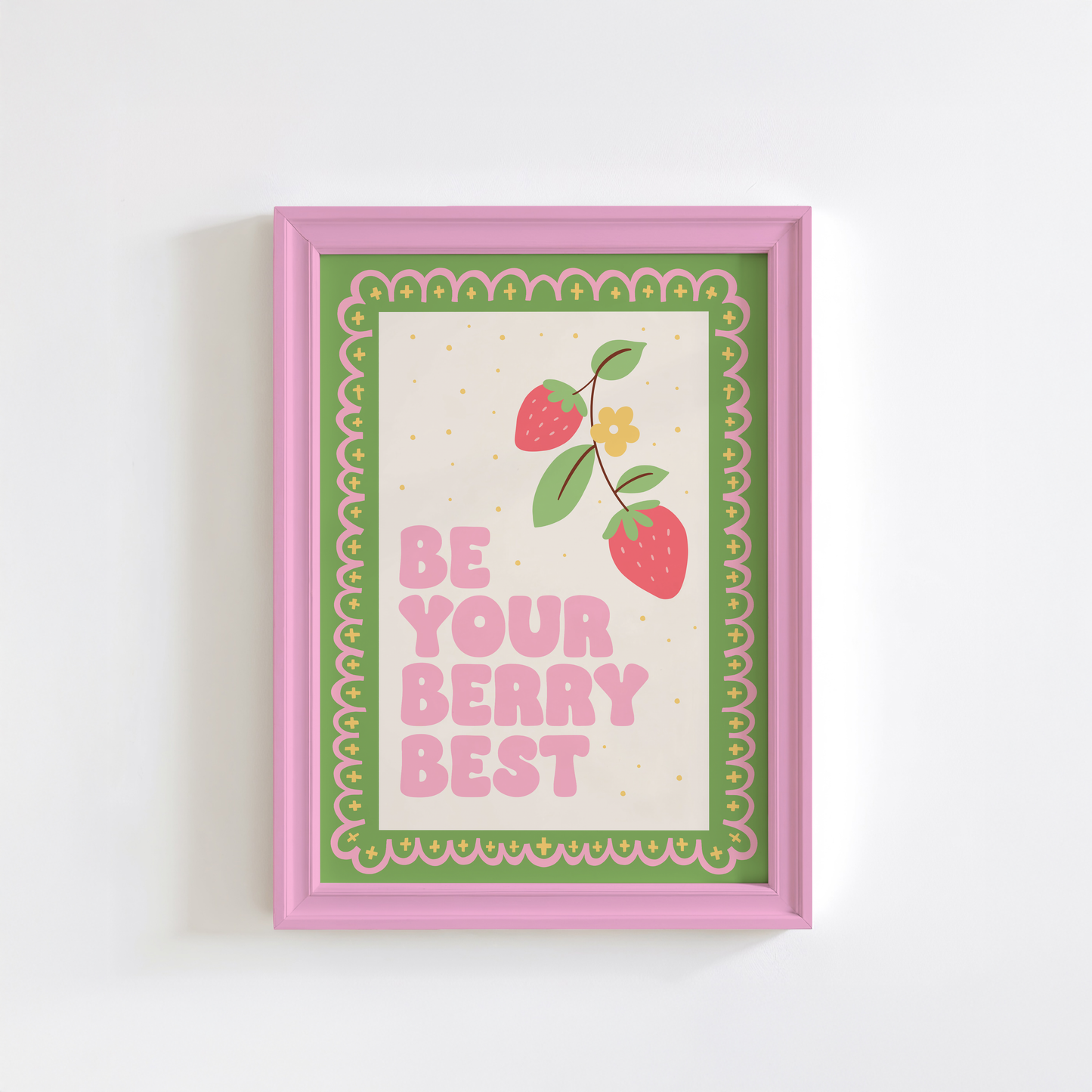 A print with a green and pink illustrated border, and a quote saying 'be your berry best' in a pink chunky font. Next to the quote is an illustration of a strawberry plant.