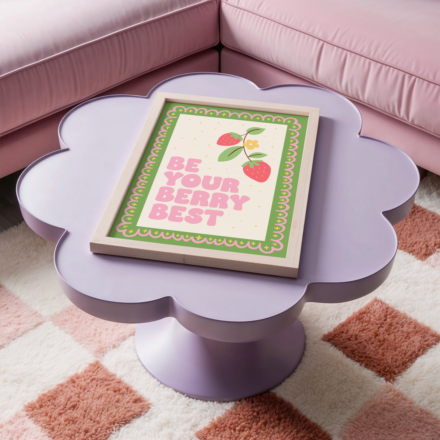 A print with a green and pink illustrated border, and a quote saying 'be your berry best' in a pink chunky font. Next to the quote is an illustration of a strawberry plant.