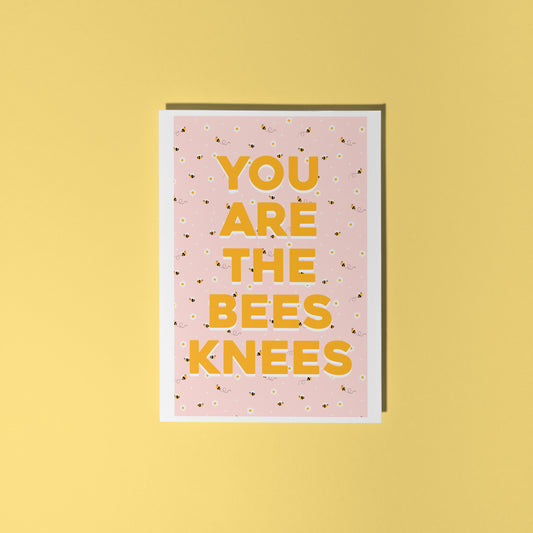 a card with a repeating pattern of buzzing bees, and text that reads 'you are the bees knees' in yellow.