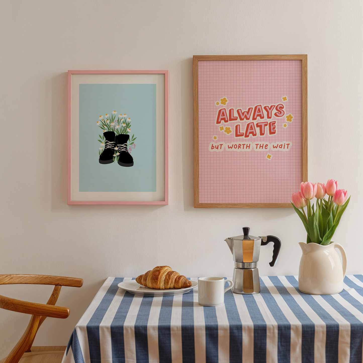 A colourful pink print with a quote saying always late but worth the wait in a contrasting red font. Shown next to a an illustration of black boots with daisies in them.