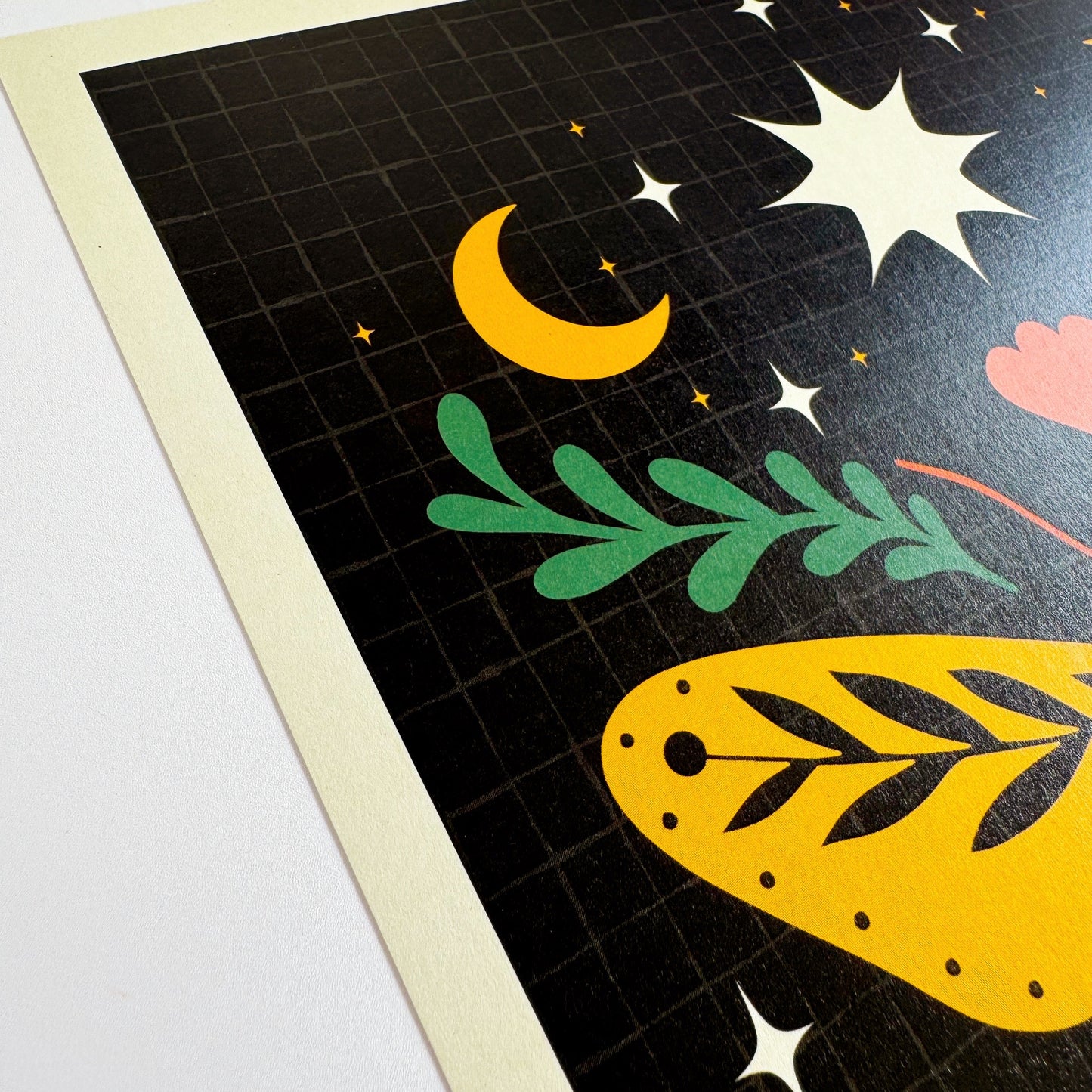 Colorful design with celestial elements on a grid background
