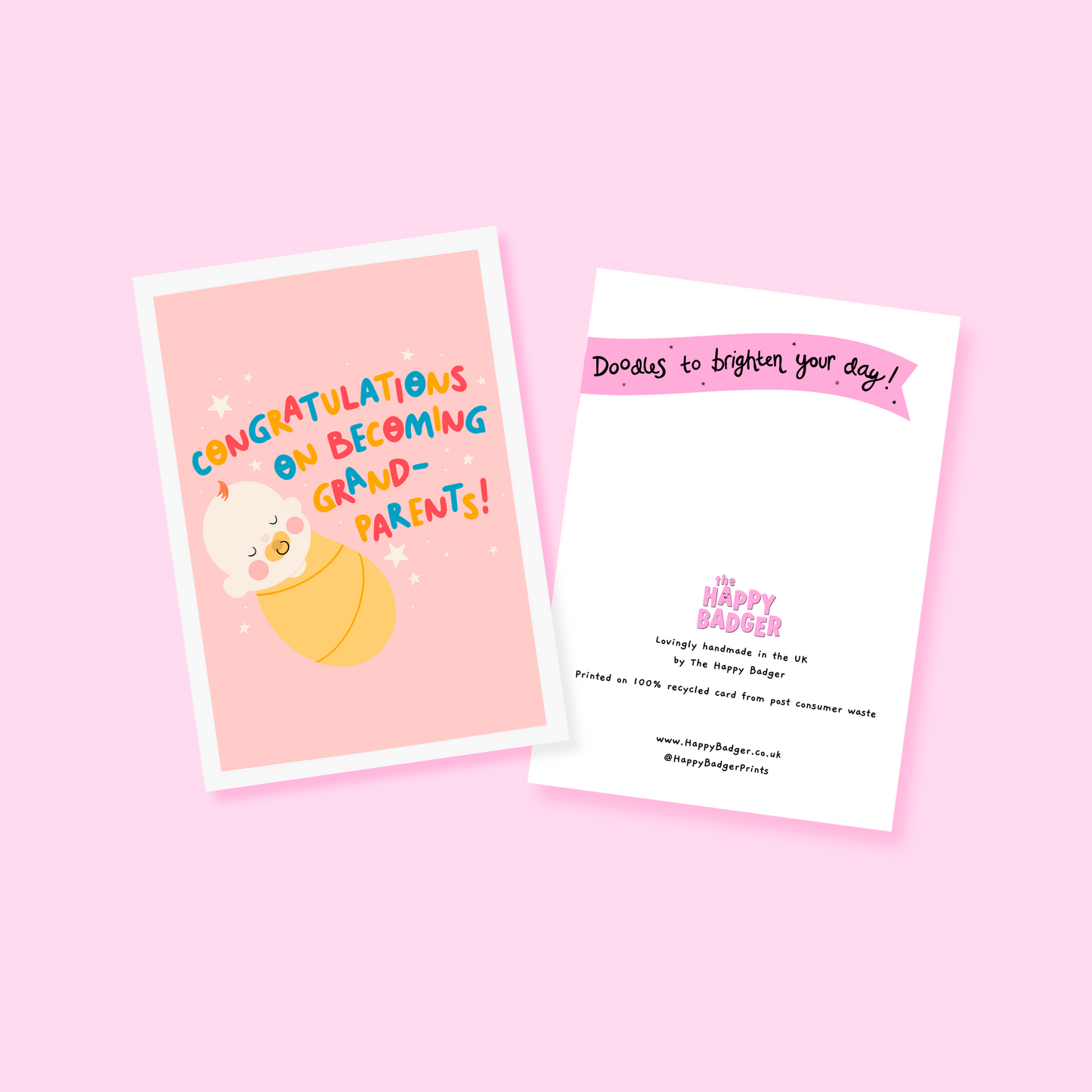 A peachy pink card with an illustration of a sleeping baby, and the words 'congratulations on becoming grand-parents!'.