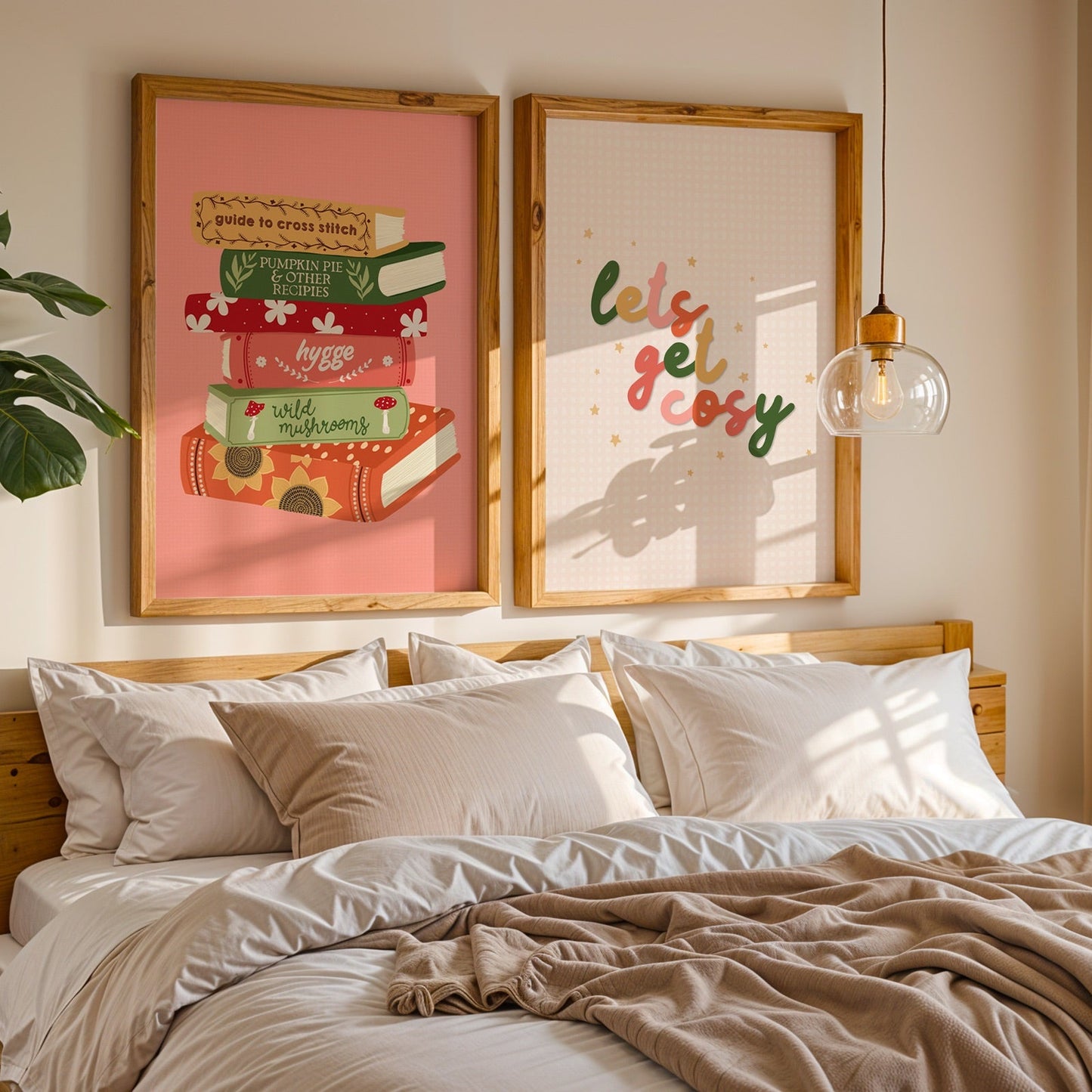Bedroom with framed artwork on the wall, featuring books and 'Let's get cozy' text.