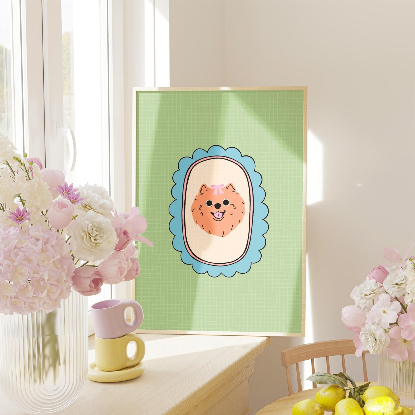 A print of an adorable orange fluffy Pomeranian with a pink pow, illustrated within a teal scallop frame on a green soft check background.