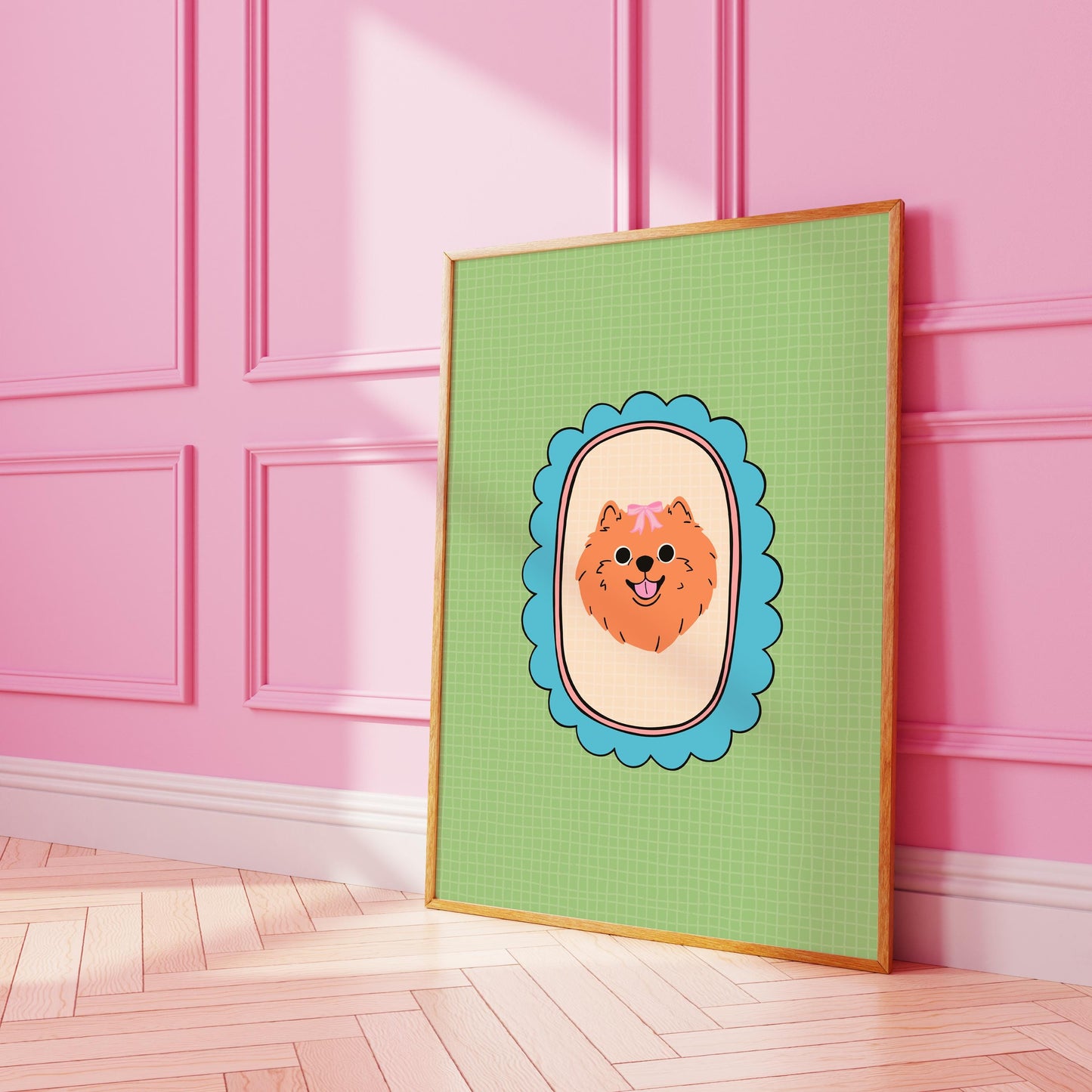 A print of an adorable orange fluffy Pomeranian with a pink pow, illustrated within a teal scallop frame on a green soft check background.