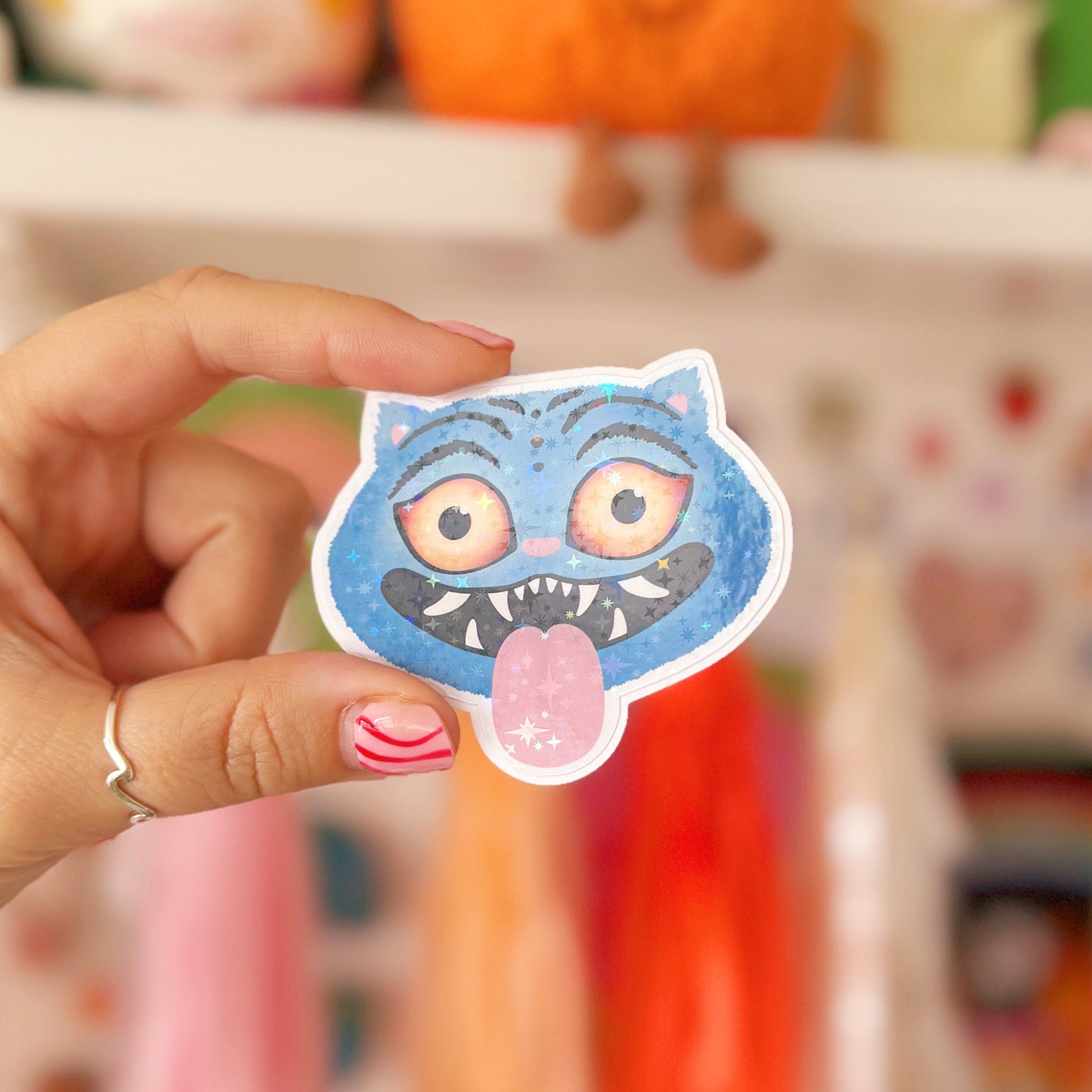 An illustrated sticker of a character from k pop demon hunters, with a holographic finish.