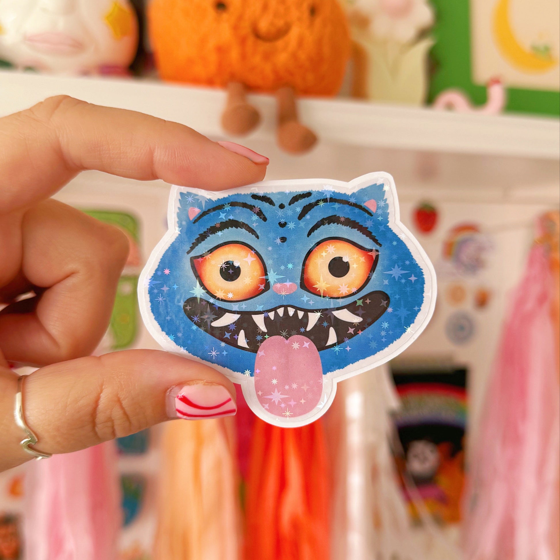 An illustrated sticker of a character from k pop demon hunters, with a holographic finish.