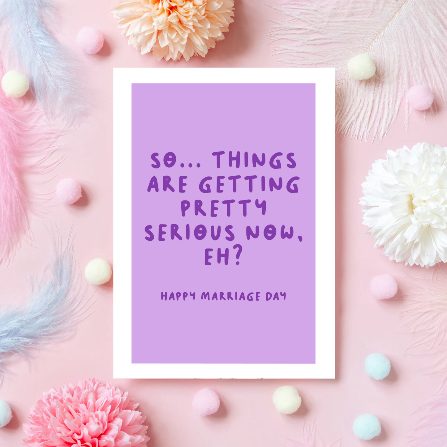 A purple card, for a wedding day celebration. It says 'so... things are getting pretty serious now, eh? happy marriage day.'
