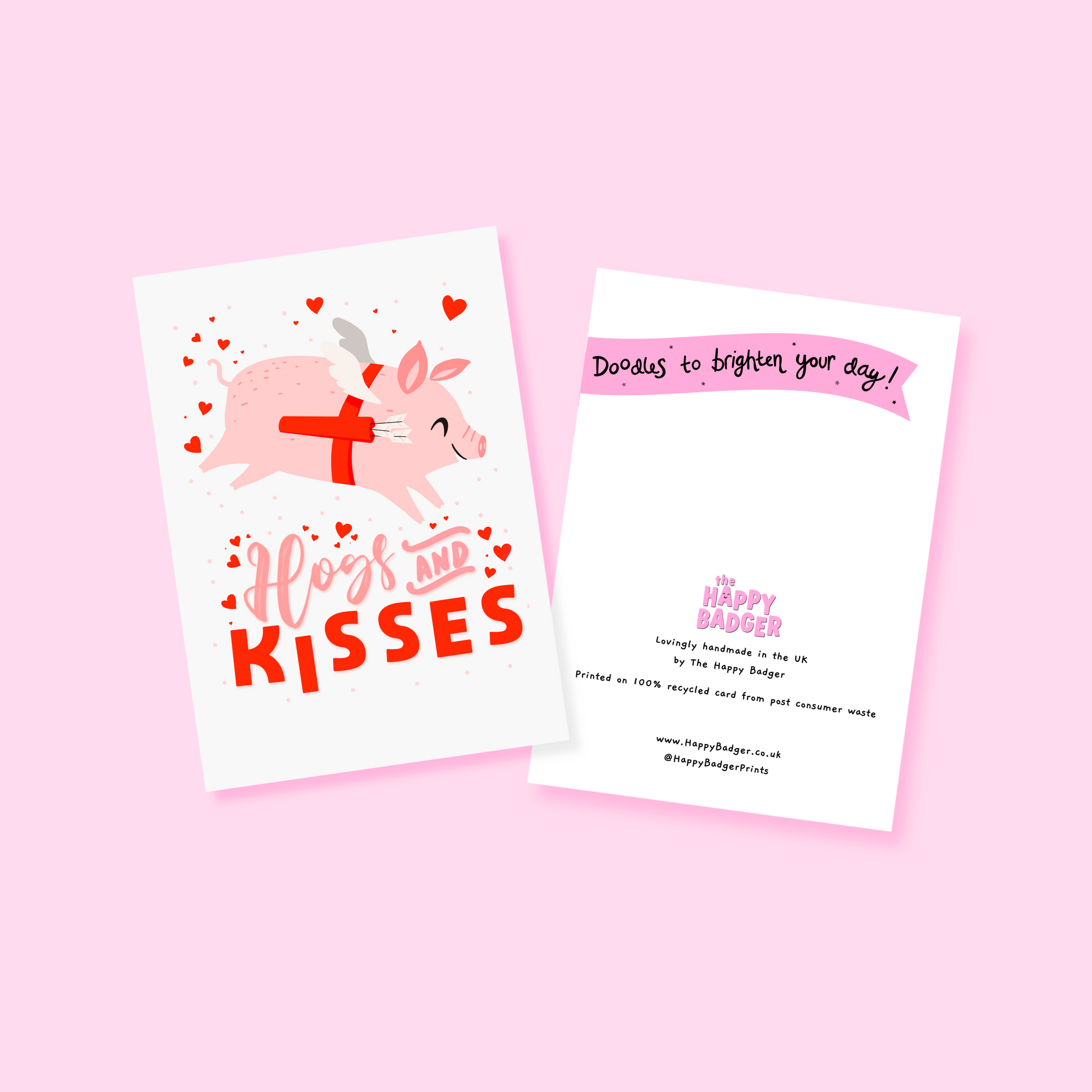 A love themed card, with a flying pig dressed as cupid and the words 'Hogs and kisses' underneath.