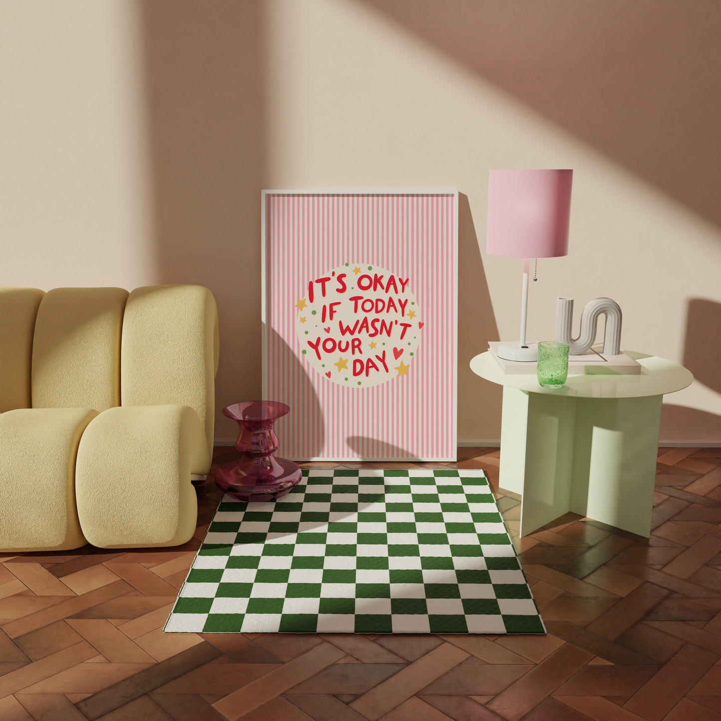 Living room with a yellow sofa, checkered rug, and motivational poster on a wall.