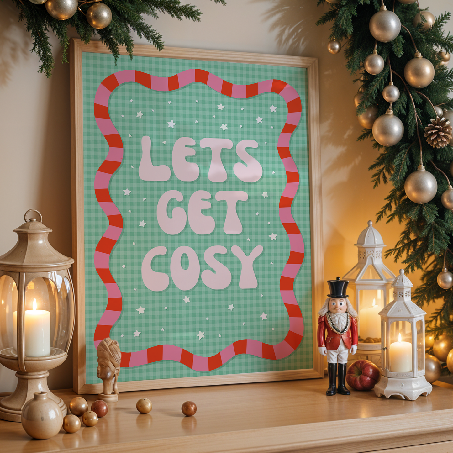 Decorative wall art with 'Let's Get Cosy' text in a festive setting with Christmas decorations.