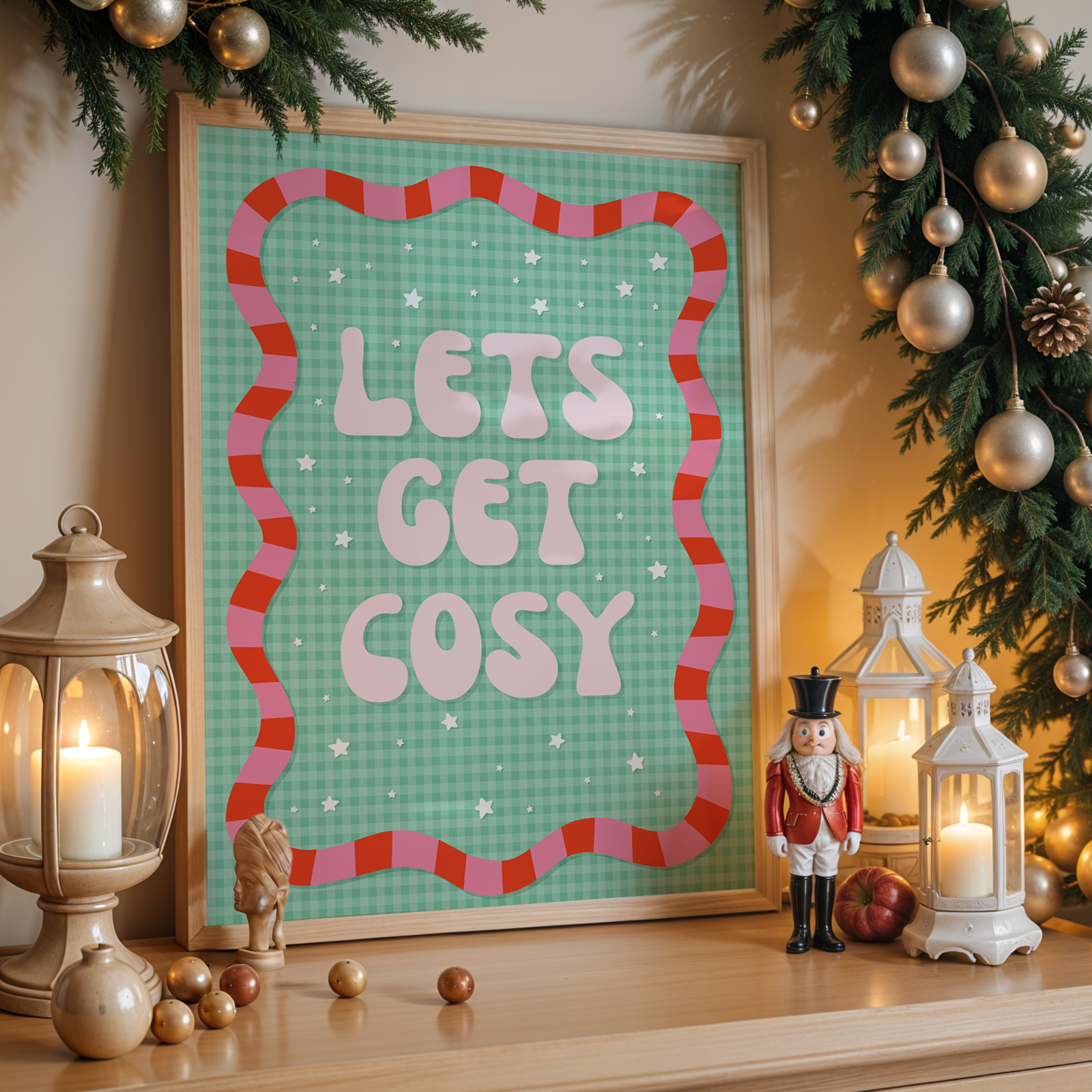 Decorative wall art with 'Let's Get Cosy' text in a festive setting with Christmas decorations.