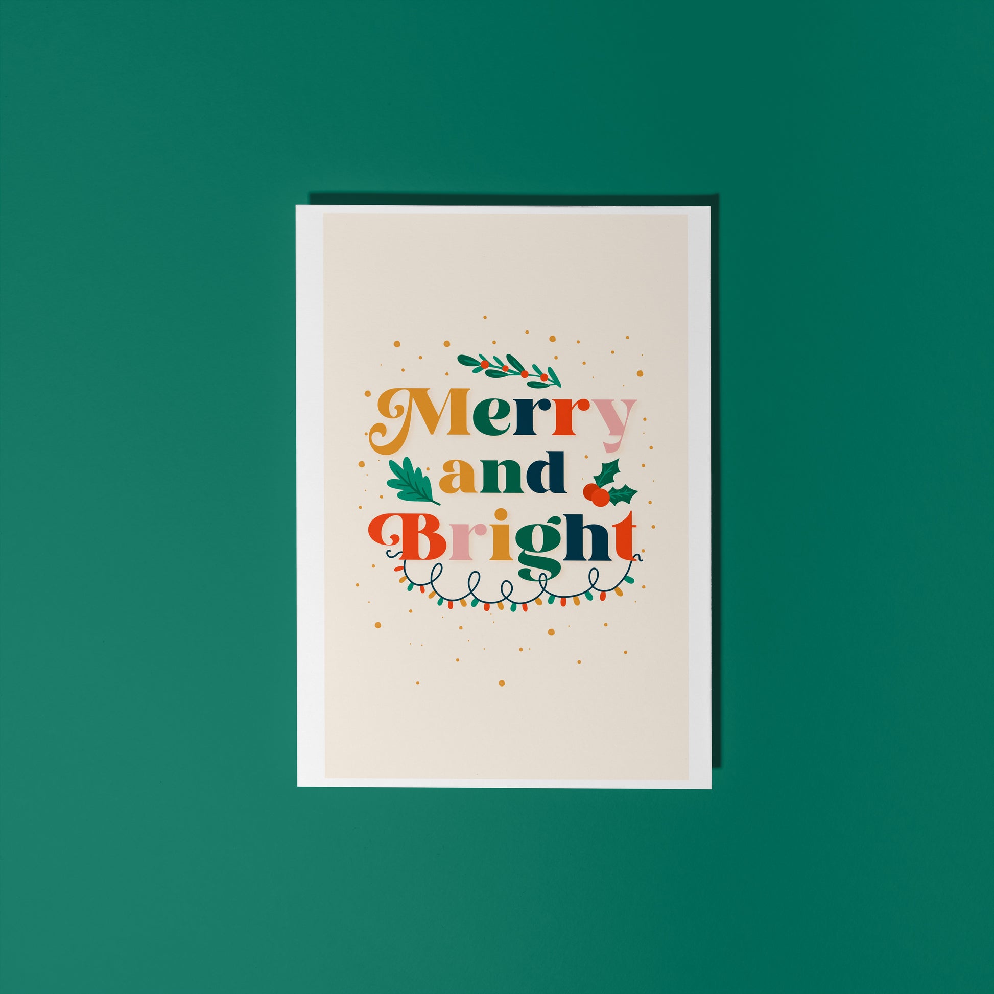 Card with 'Merry and Bright' text on a green background