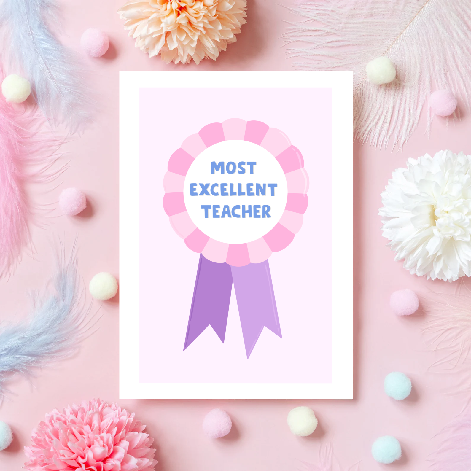 A greetings card with a rosette with text saying most excellent teacher. The colour combo is pink and purple.