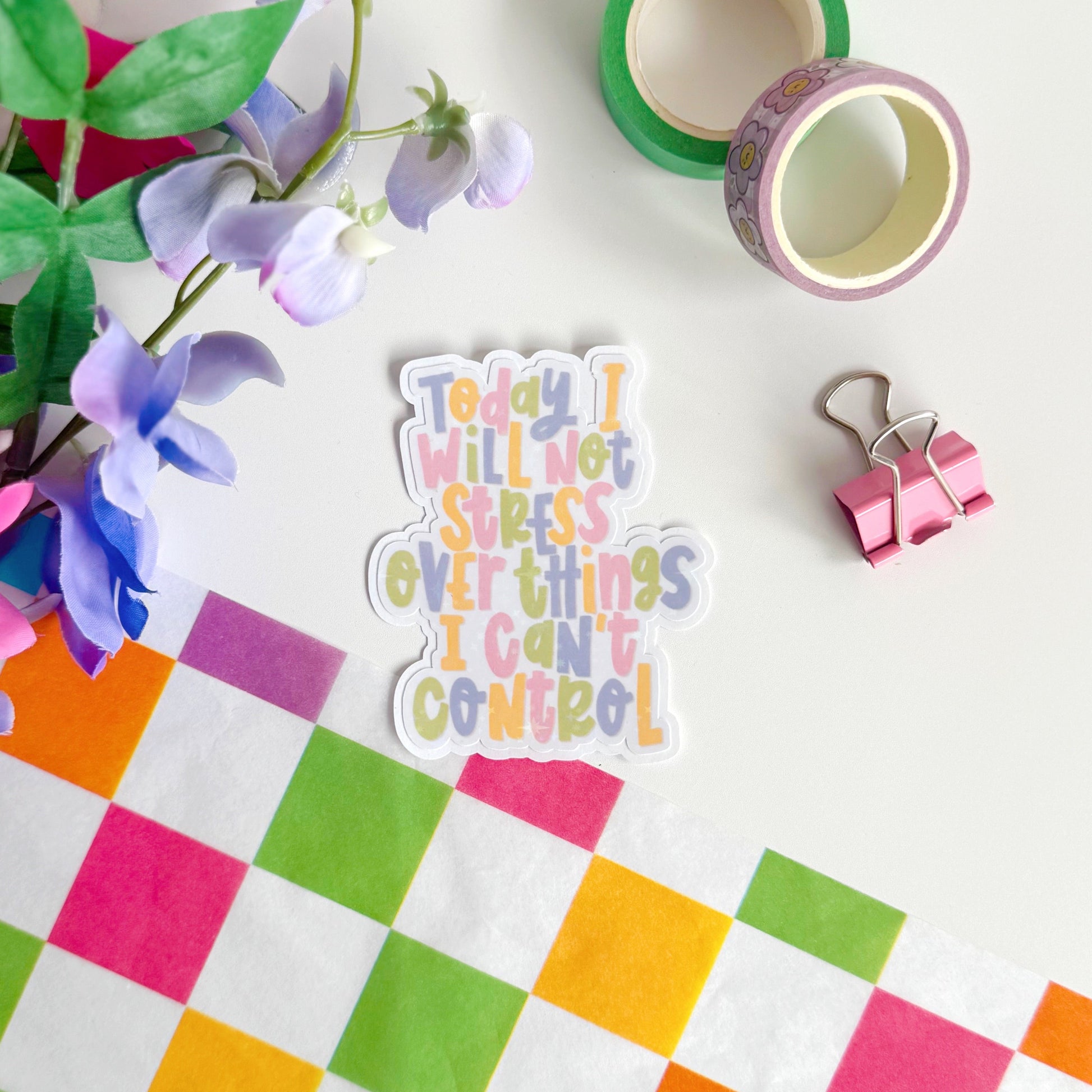 A holographic sticker, with the quote today I will not stress over things I can't control on it. The sticker has an easy peel lip.