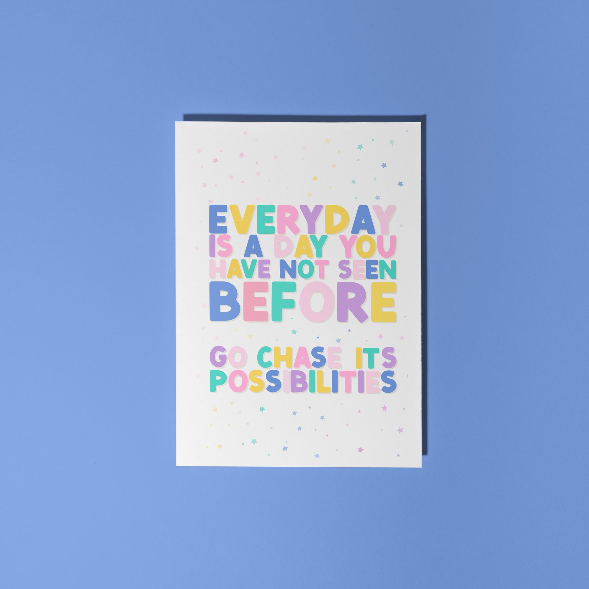 A greeting card with a positivity message; saying to go chase the possibilities of a new day.