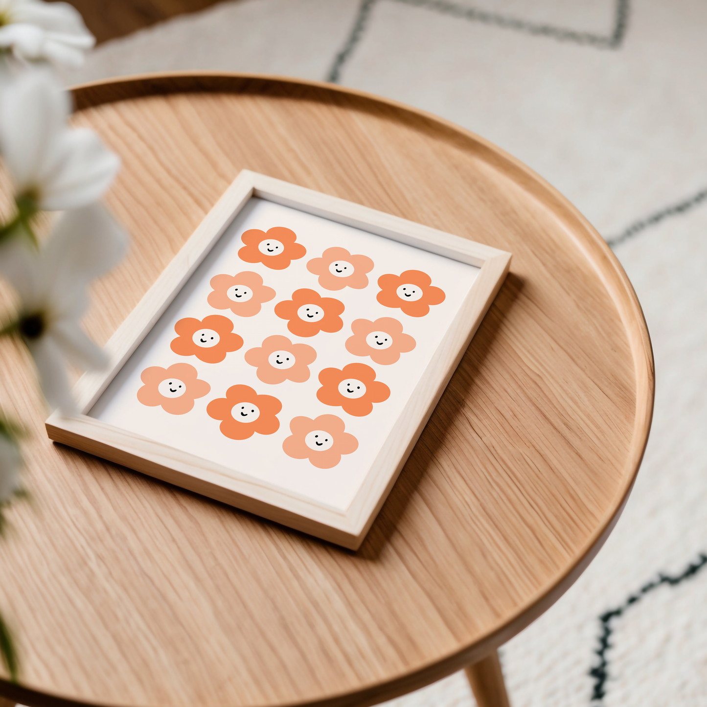 A neutral background print, with 12 smiling orange daisies on.