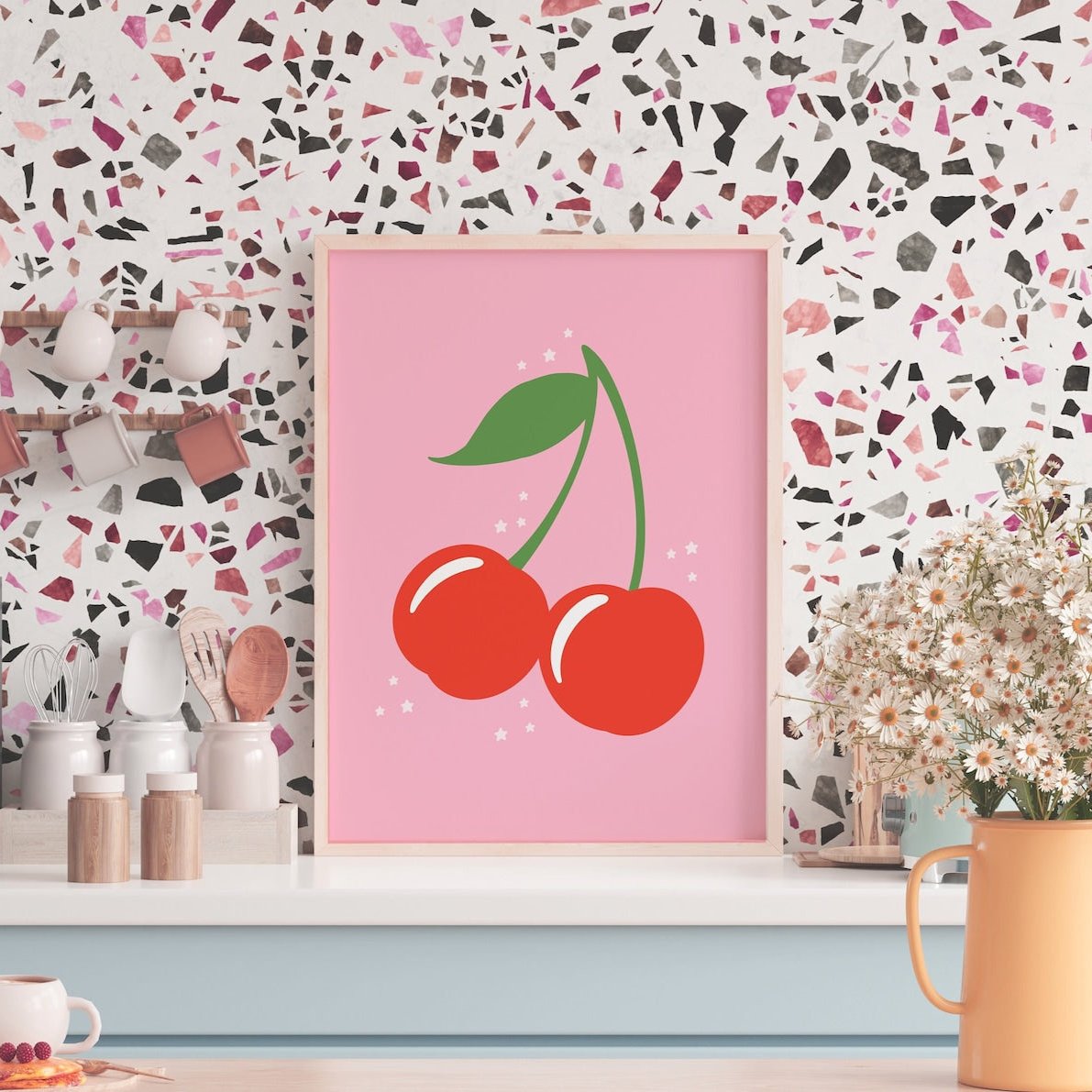 A bright pink print showing a cute illustration of red cherries.