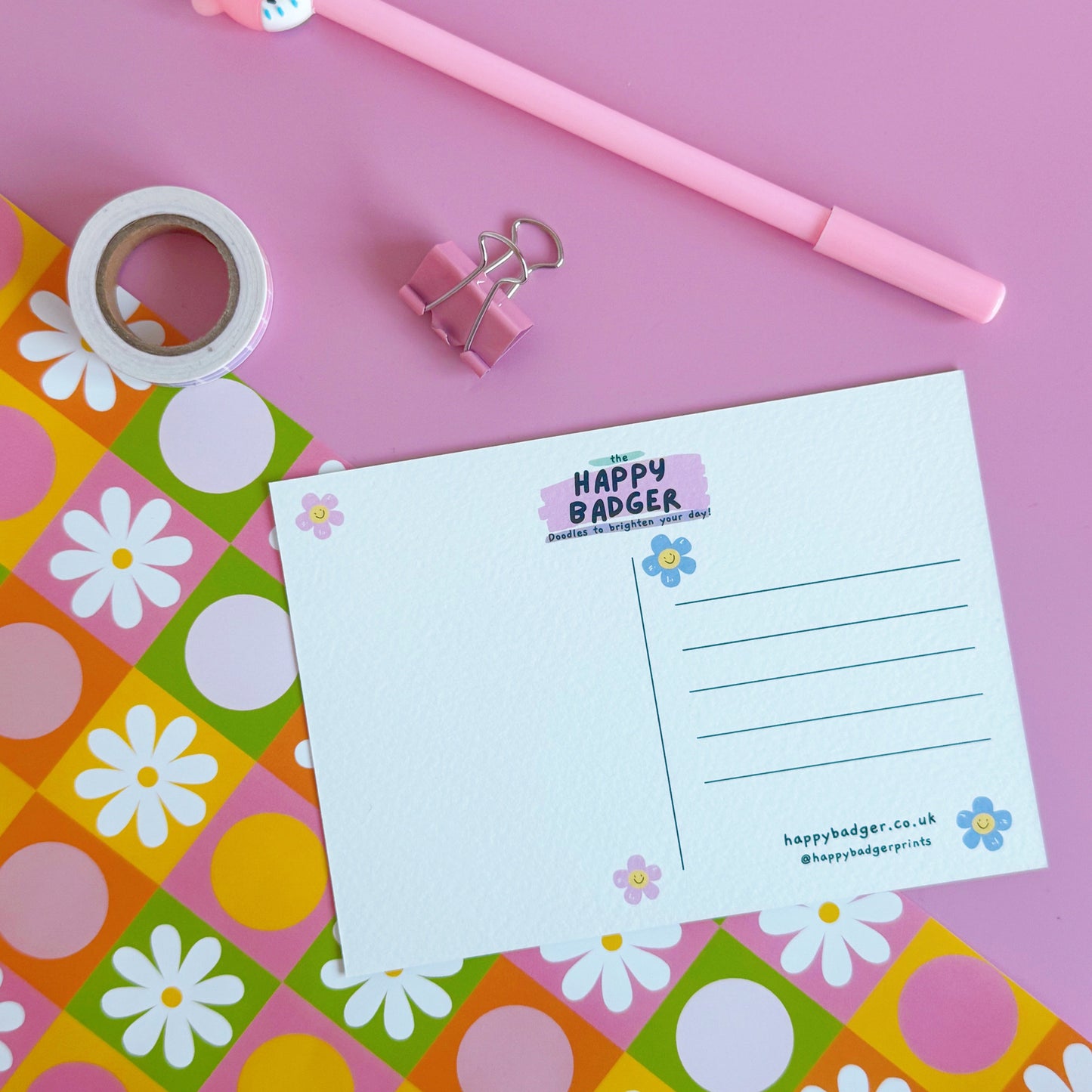 An image of the back of our standard postcards, it has room for a message and for an address and stamp.