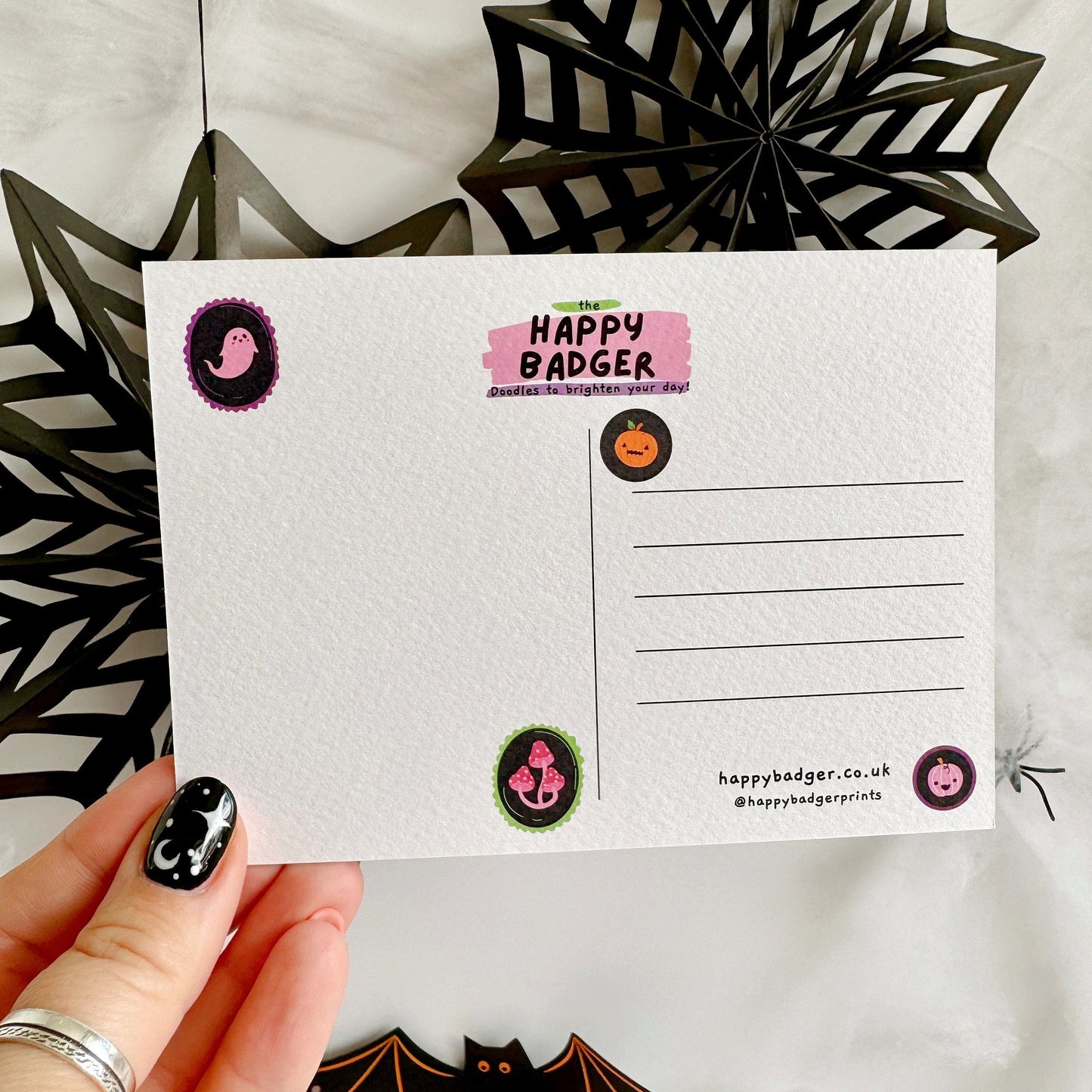 The back of our halloween themed textured postcards.