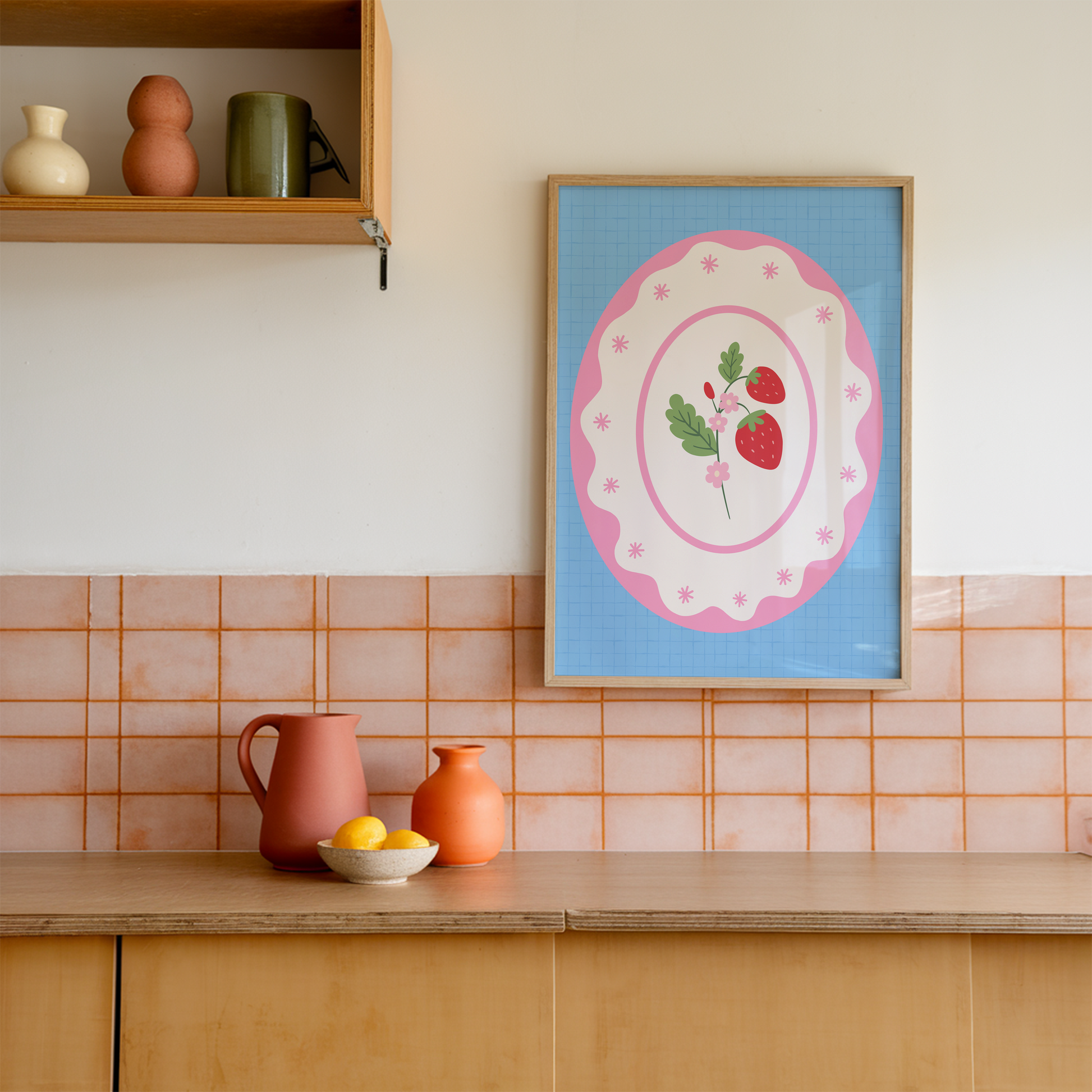 A blue and pink print, with an illustration of a flower stem with two strawberries on it.