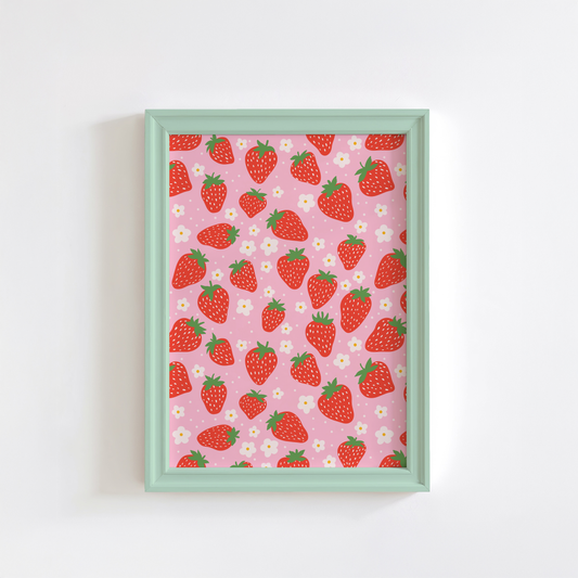 A vibrant patterned print featuring strawberries and small white daisies, on a pink background.