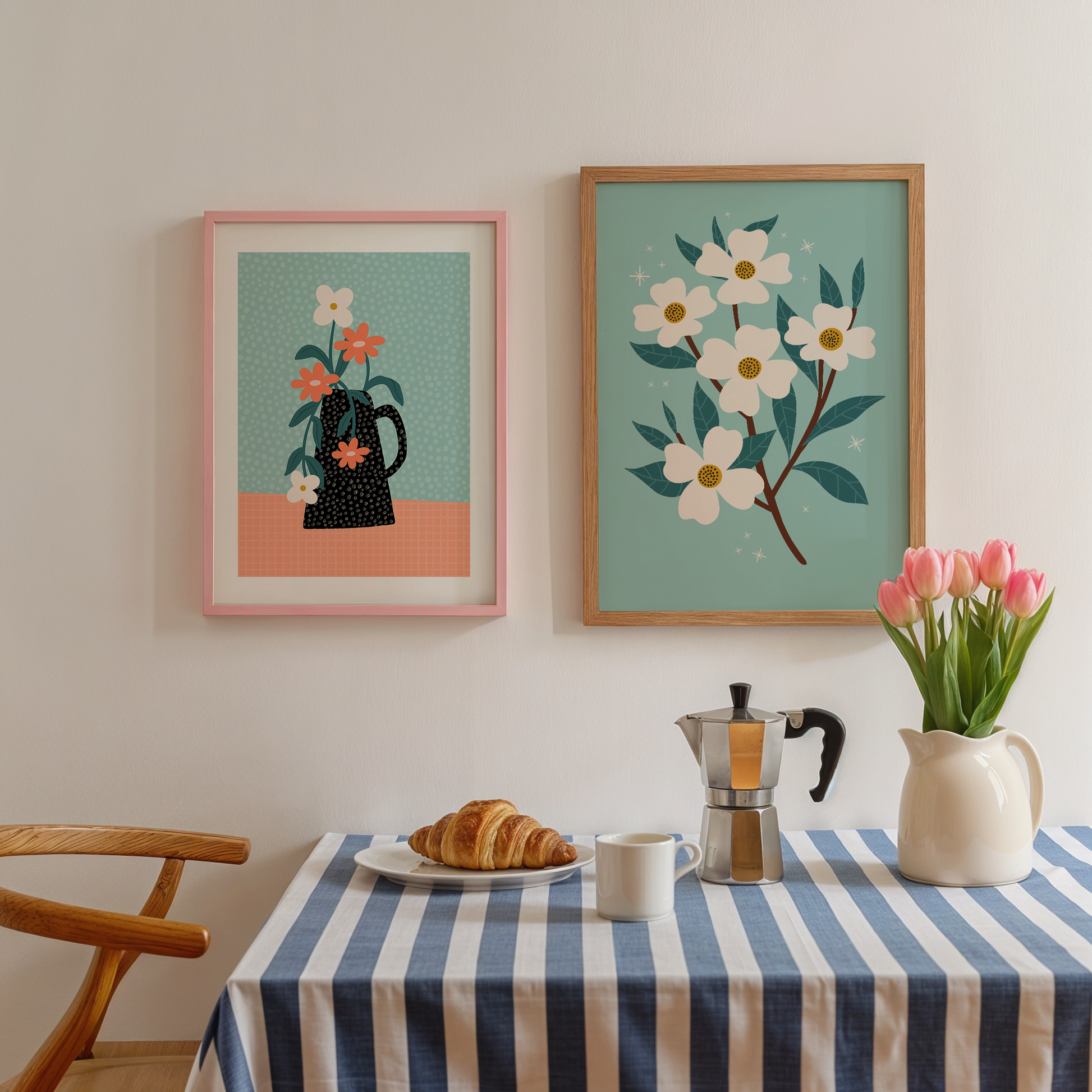 An illustration print of white flowers, on a branch with dark teal leaves. Set on a bright teal background. Shown next to a teal and orange print of a jug of flowers.