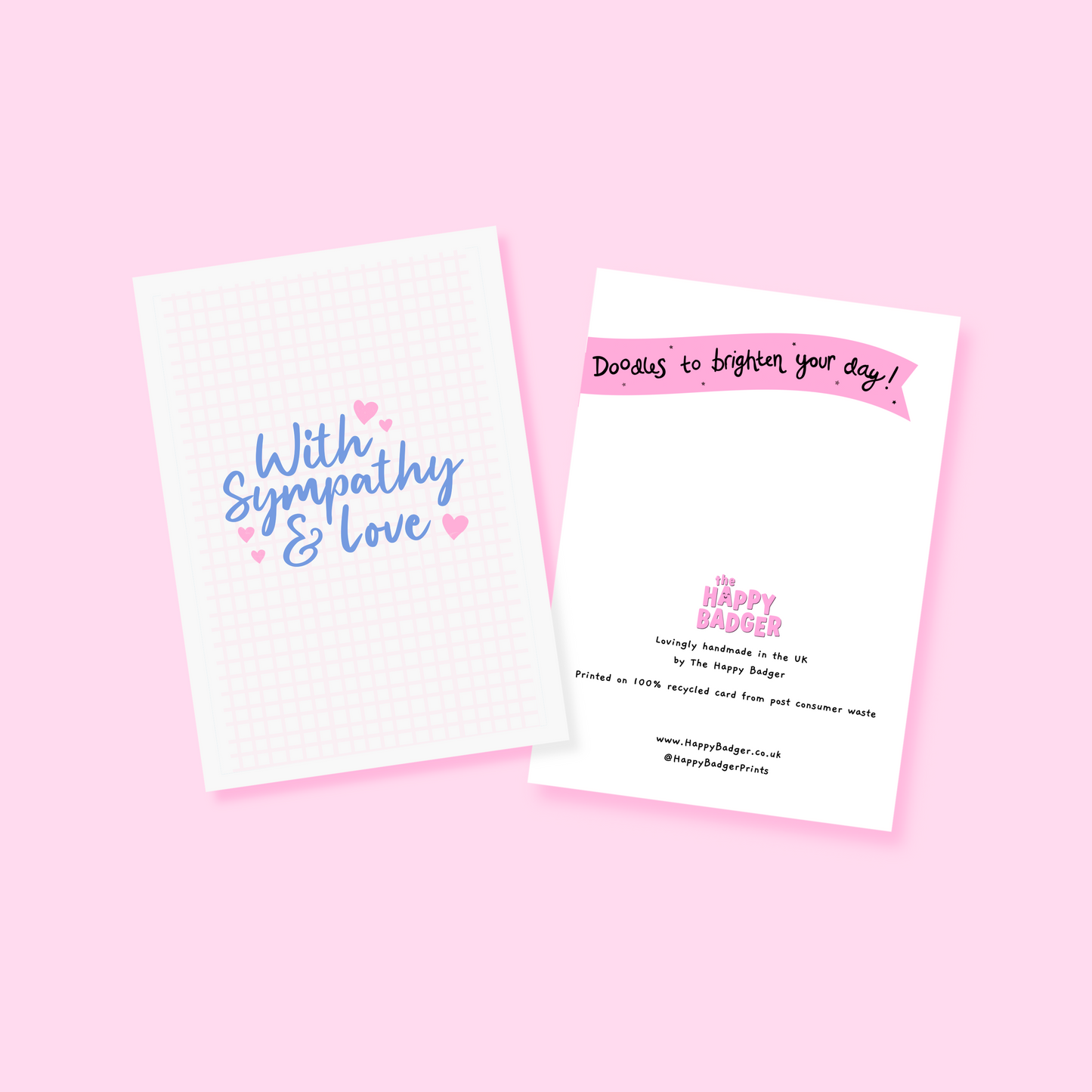 A simple card, with the words with sympathy and love in a blue script font surrounded by small pink hearts.