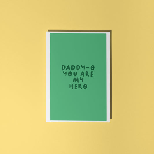 A green fathers day card, with text that reads 'Daddy-o you are my hero'.