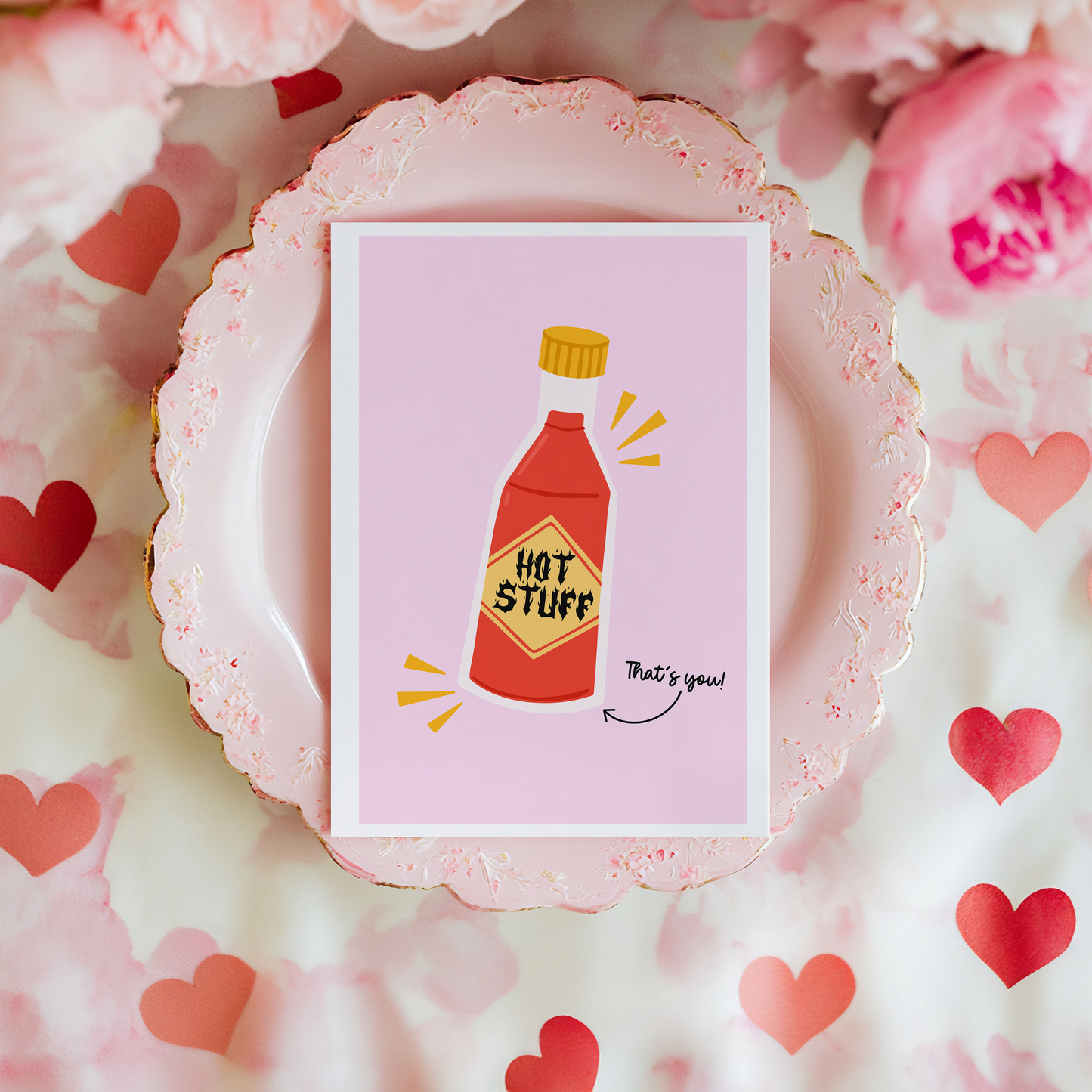 A funny card with a bottle of hot sauce, saying 'Hot Stuff' on it.