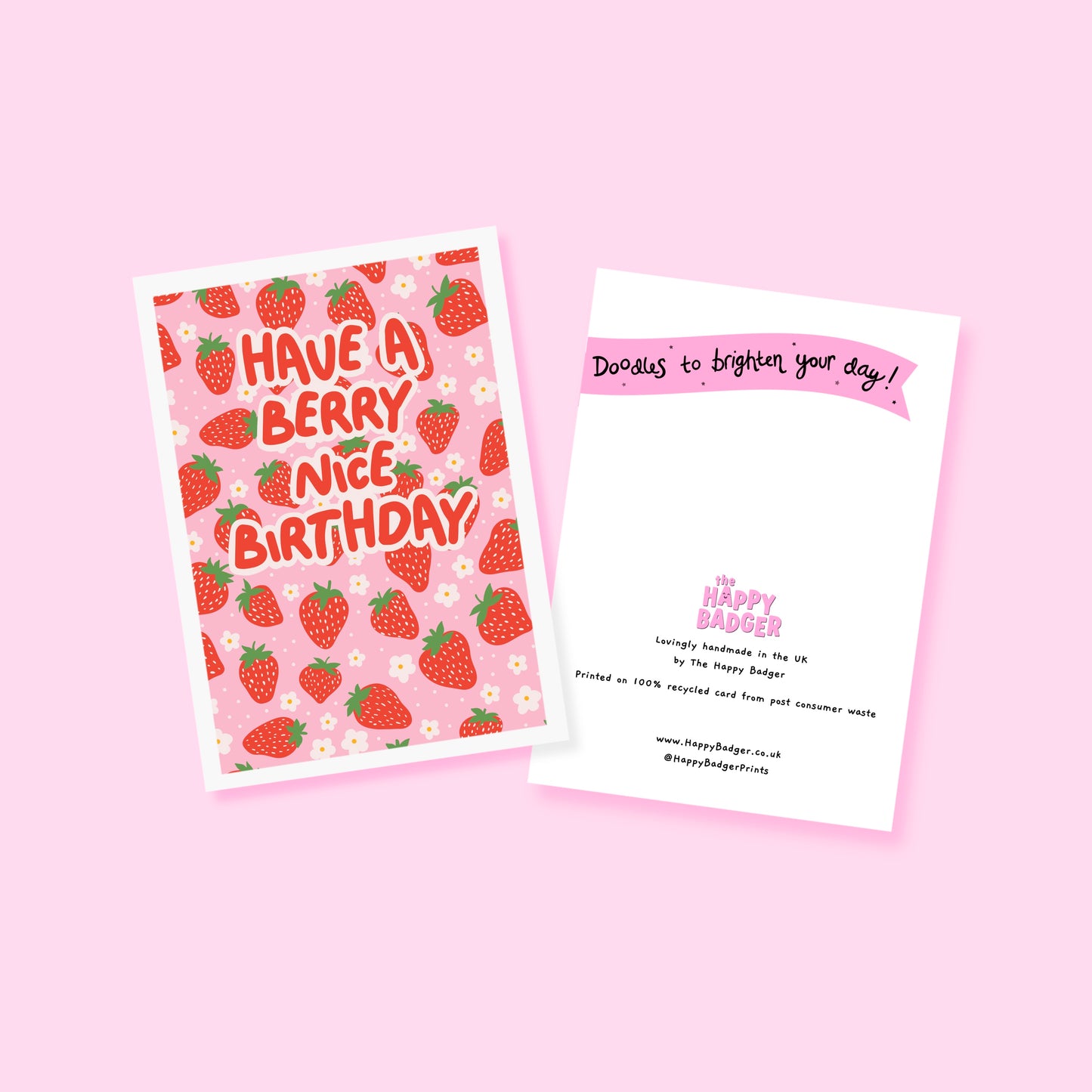 A pink and red card, with a strawberry pattern, and text saying 'have a berry nice birthday'.