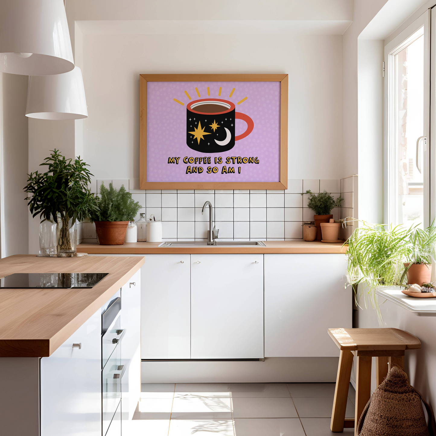A framed print with a vibrant illustration of a coffee mug, with stars and a sun motif, and the text 'MY COFFEE IS STRONG AND SO AM I!' on a purple background.
