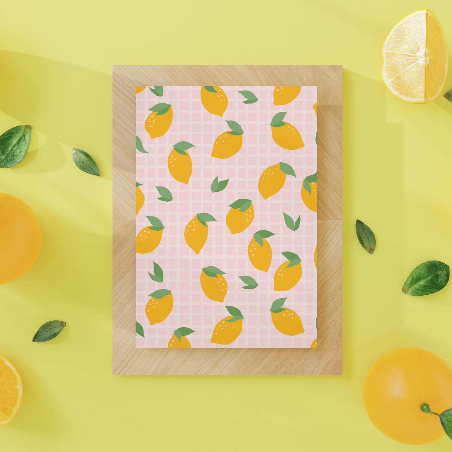 A zesty lemon pattern print, on a pink checkered background.