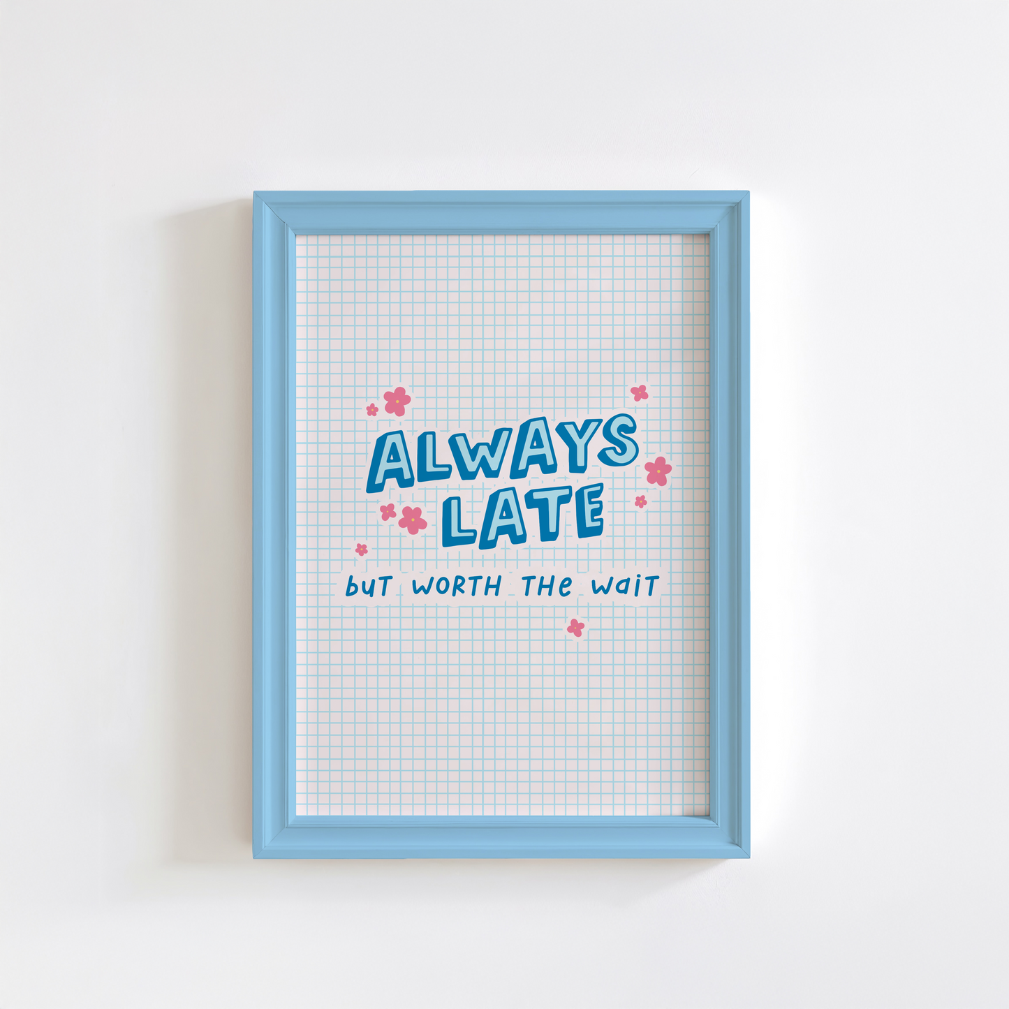 An illustration of a blue print, with a funny quote stating always late but worth the wait, shown in a frame.