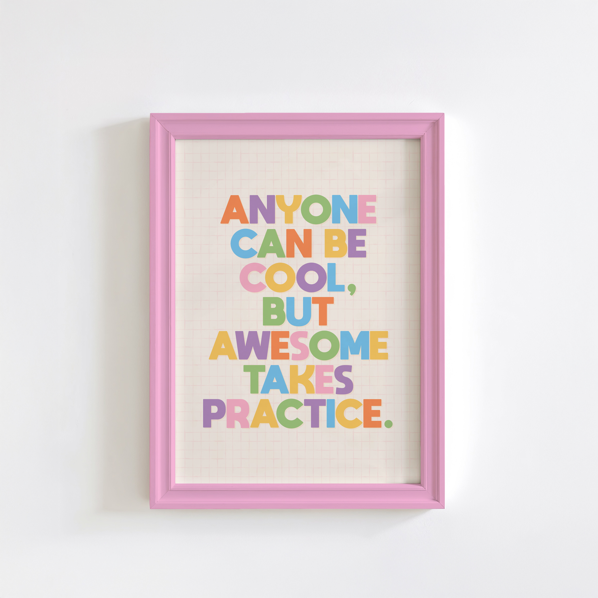 A typography print with a funny motivational quote on, in vibrant colours, shown in a frame.