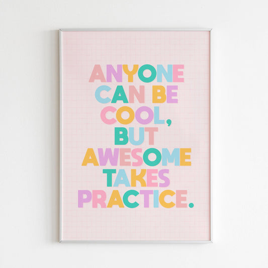 A typography print with a funny motivational quote on, in vibrant colours, shown in a frame.