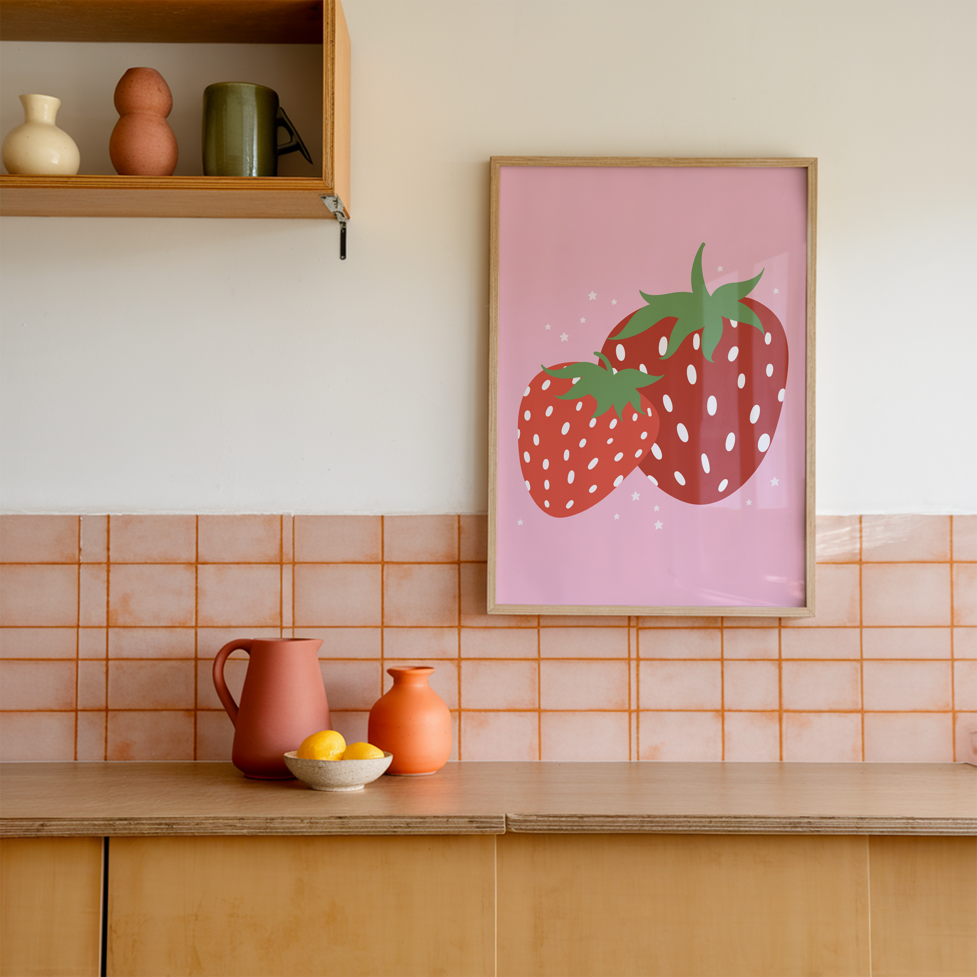 Kitchen with a strawberry-themed poster on the wall, colorful tiles, and kitchenware.