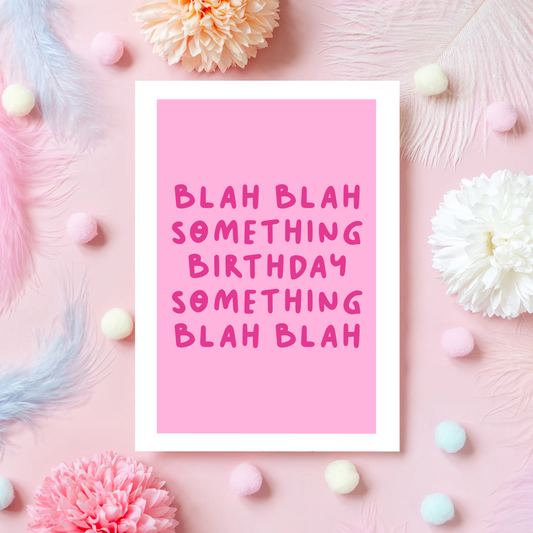 A birthday card, in pink, saying blah blah something birthday something blah blah