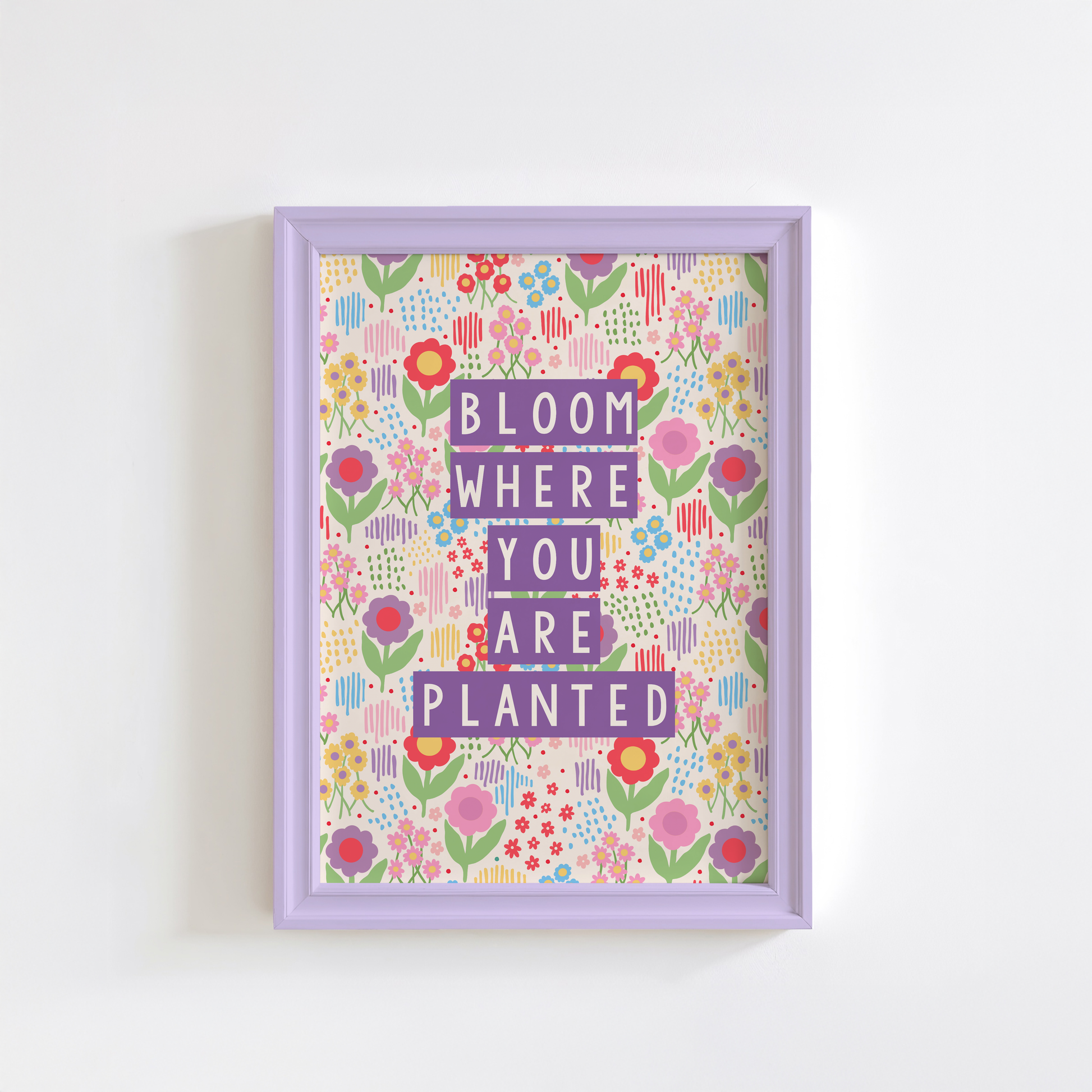A colourful illustration of a floral background with purple text saying bloom where you are planted.