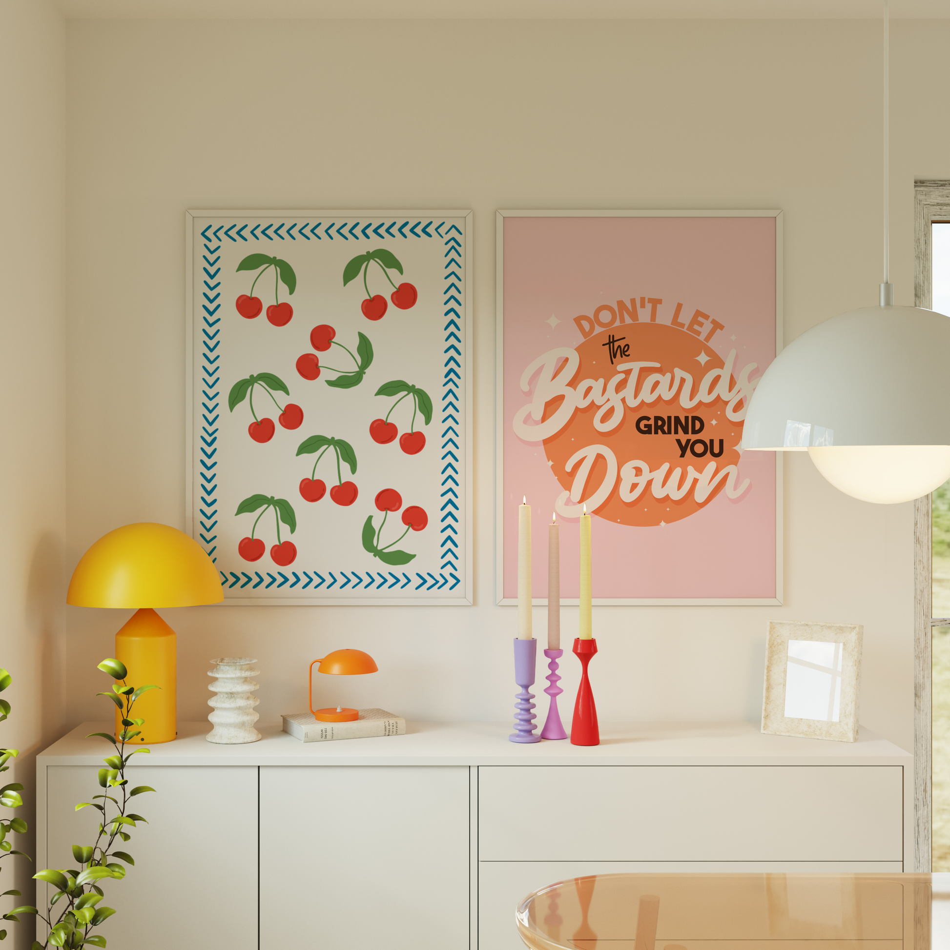 A bright pink and orange print showing a funny quote - don't let the bastards grind you down. Shown next to a cute white and blue print with red cherries.