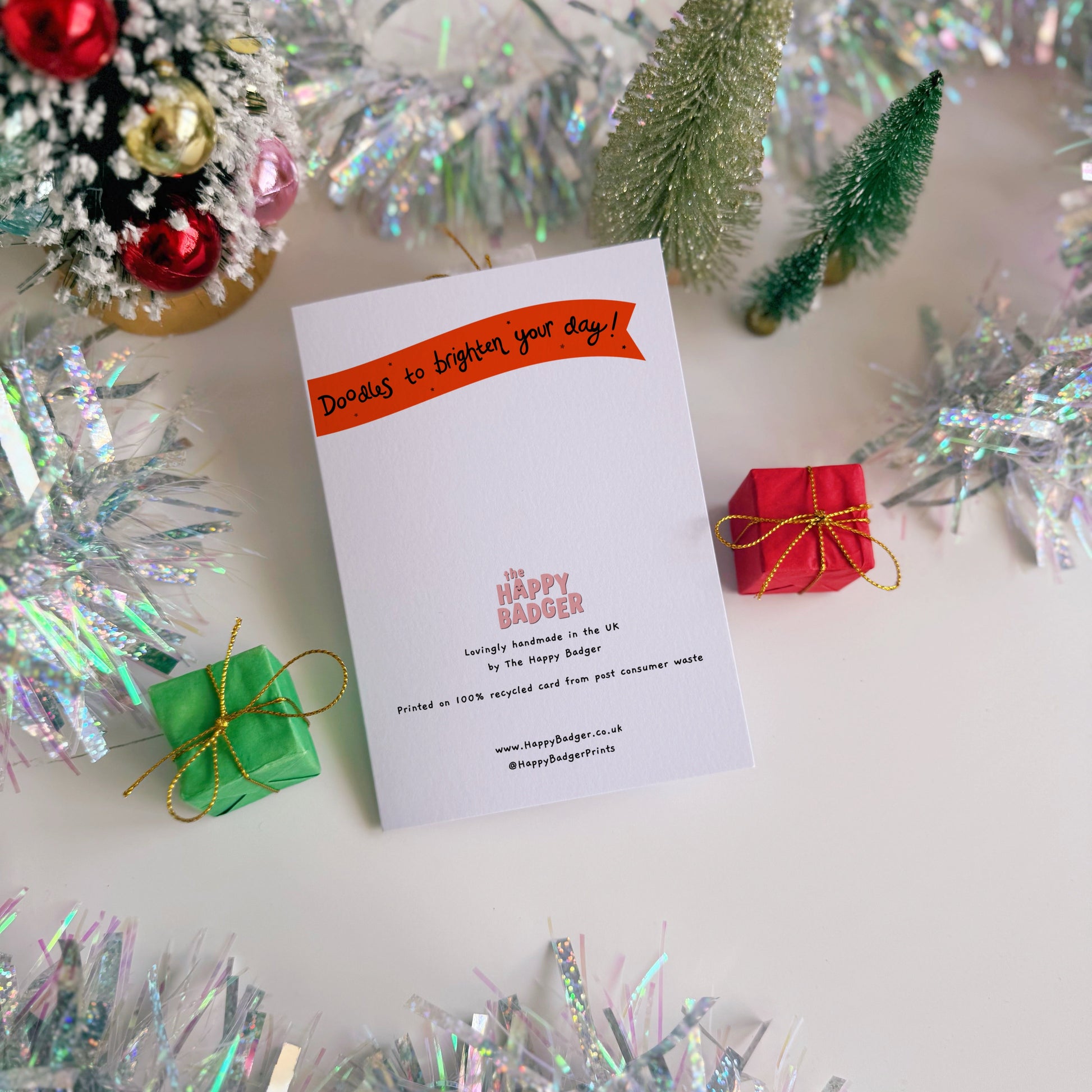 The back of our Christmas cards with our logo and branding.