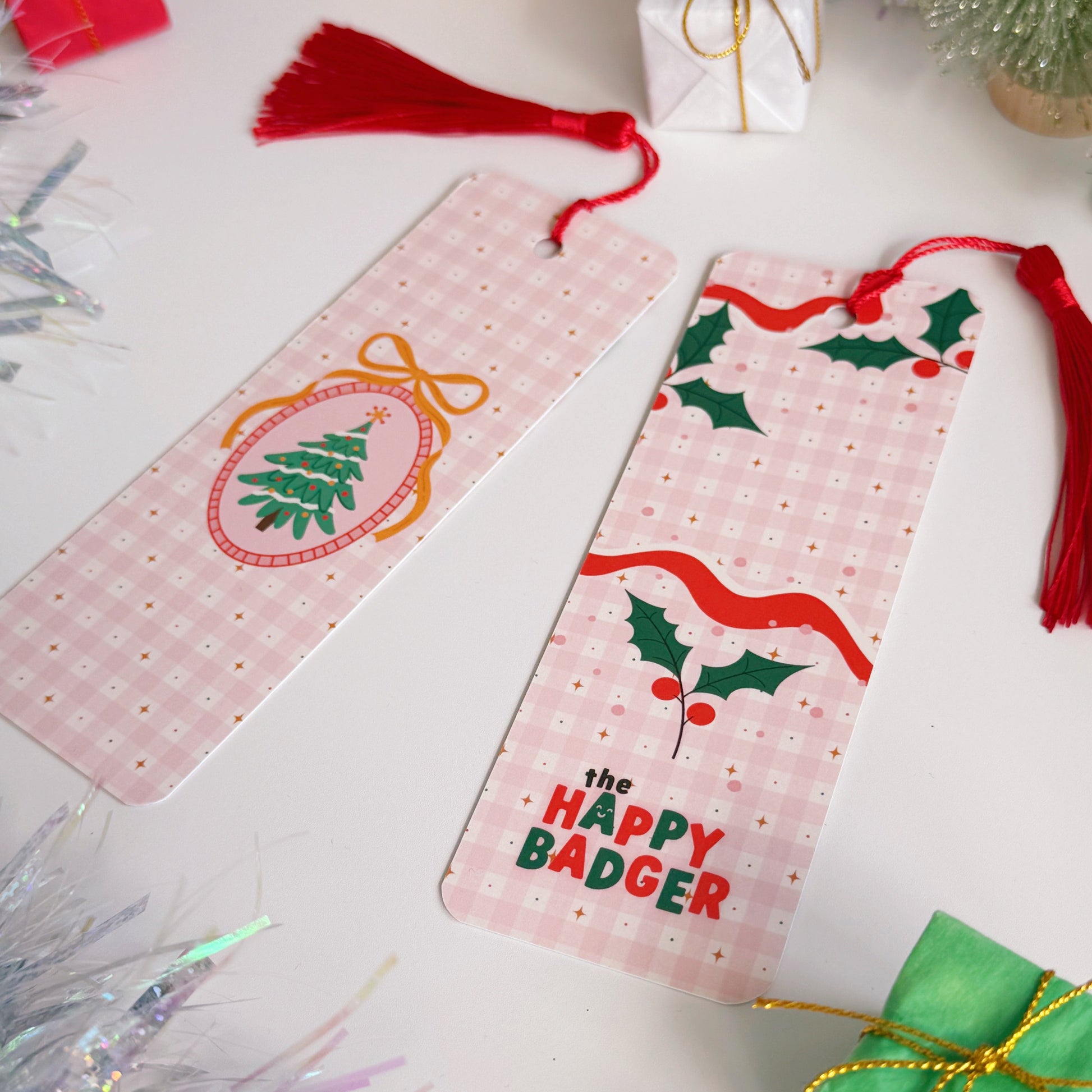 A Christmas-themed bookmark with decorative elements on a festive background.