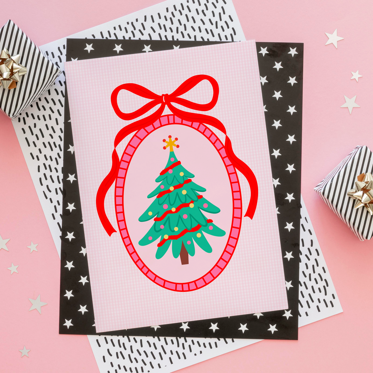 An illustration of a Christmas tree, surrounded by a hand drawn border with a large red bow on top. The background of the print is a soft pink gingham.