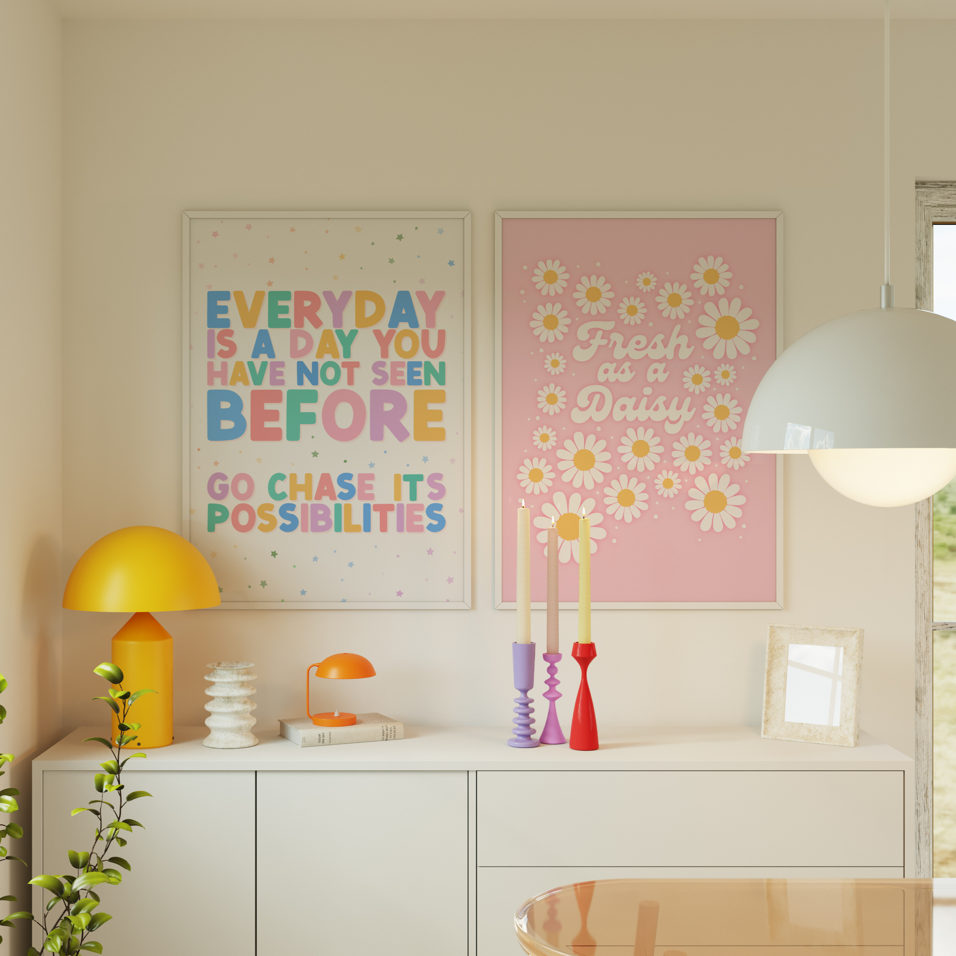 A colourful quote print, that says 'every day is a day you have not seen before, go chase its possibilities'. Shown next to a pink print with several daisies on, and the words 'fresh as a daisy' in the centre.
