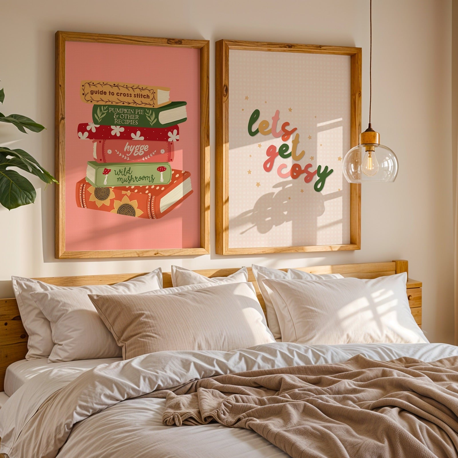 Bedroom with framed artwork on the wall, featuring books and 'Let's get cozy' text.