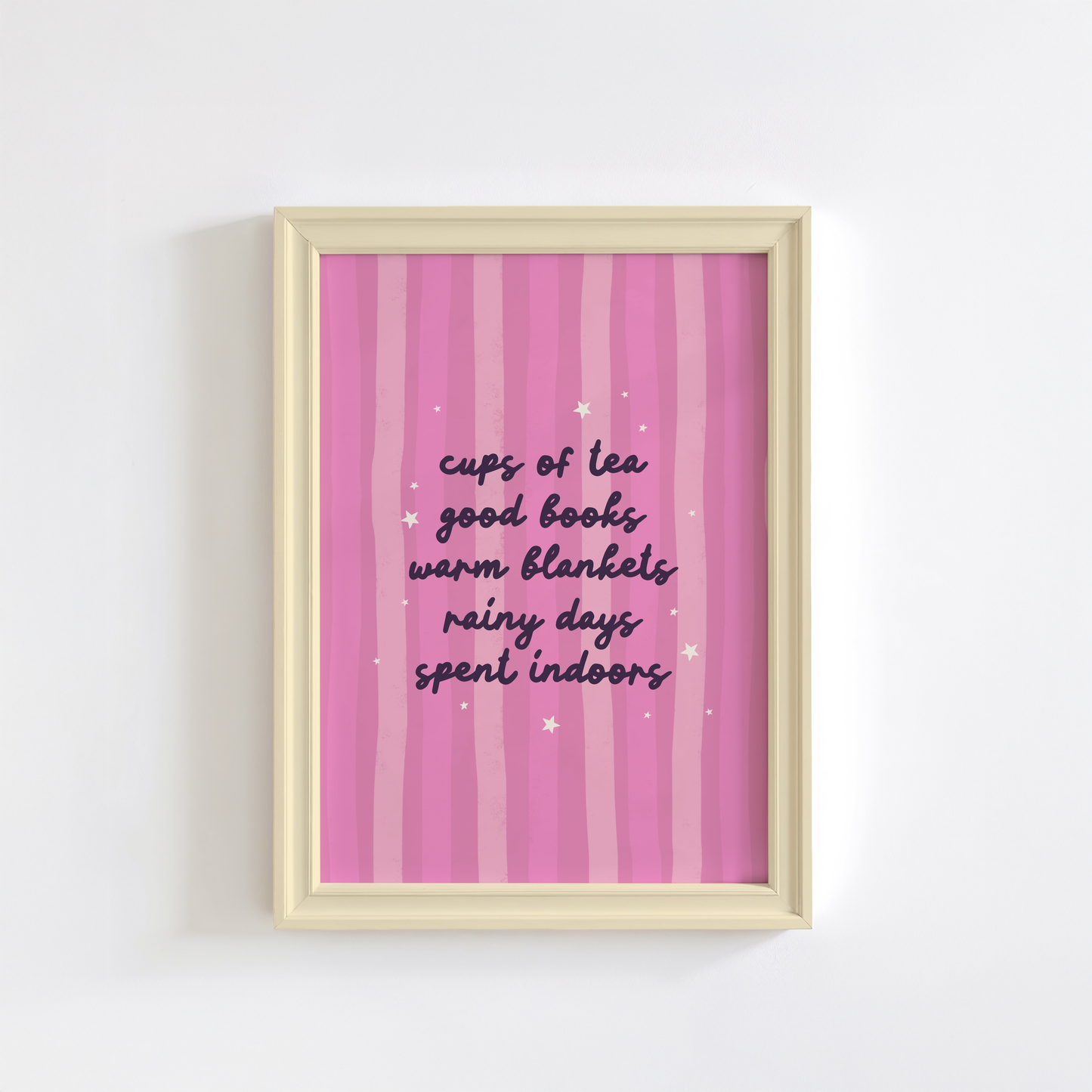 A purple striped background with a cosy quote about what makes a perfect cosy day indoors (tea, books, blankets and rain!)