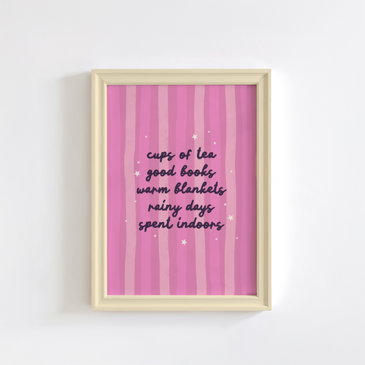 A purple striped background with a cosy quote about what makes a perfect cosy day indoors (tea, books, blankets and rain!)
