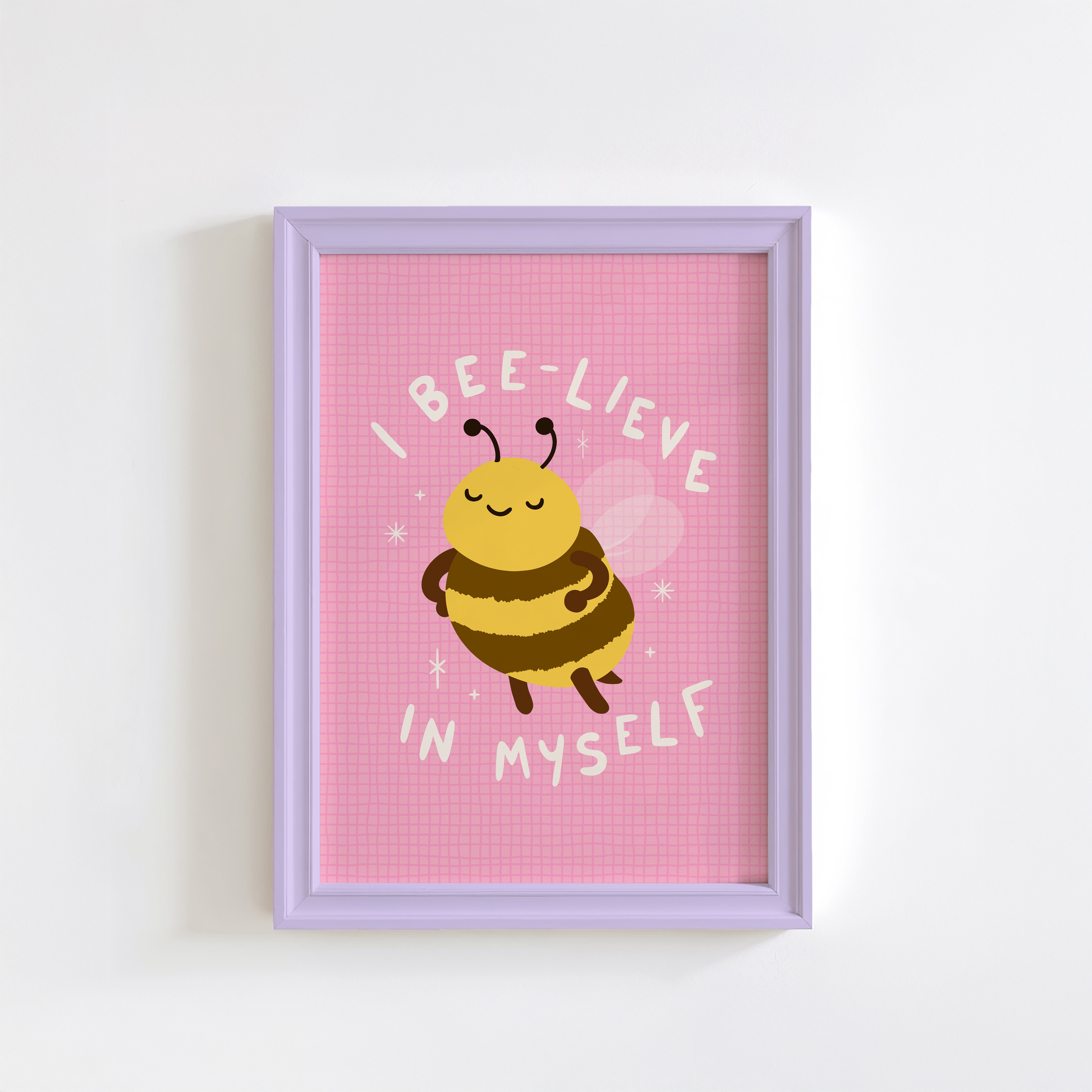 A pink print with an illustration of a cute little bumble bee, and hand written text that reads 'I believe in myself'.
