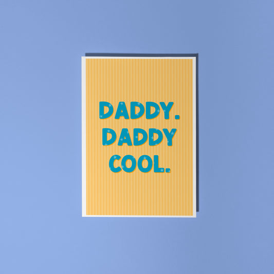 A yellow striped card, with bold blue text that reads 'Daddy. Daddy Cool.'